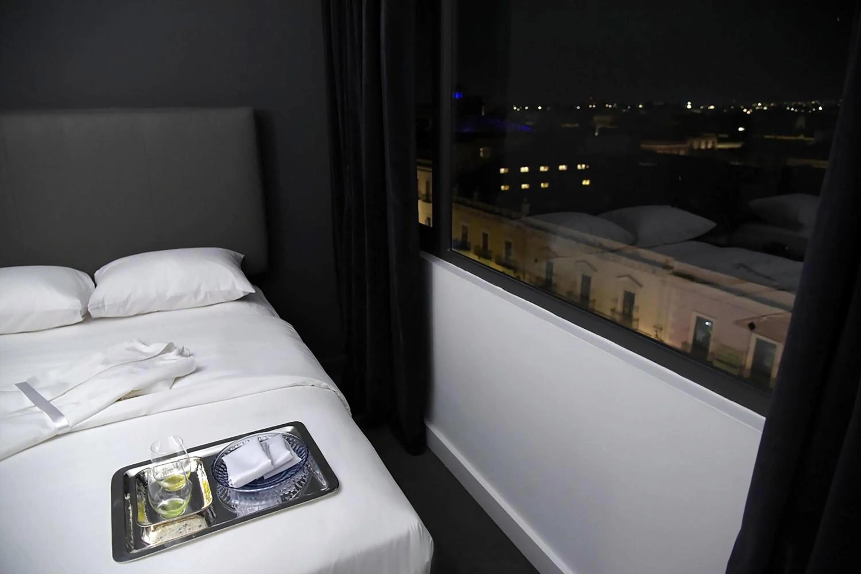 Bed in Palacio Julio Hotel