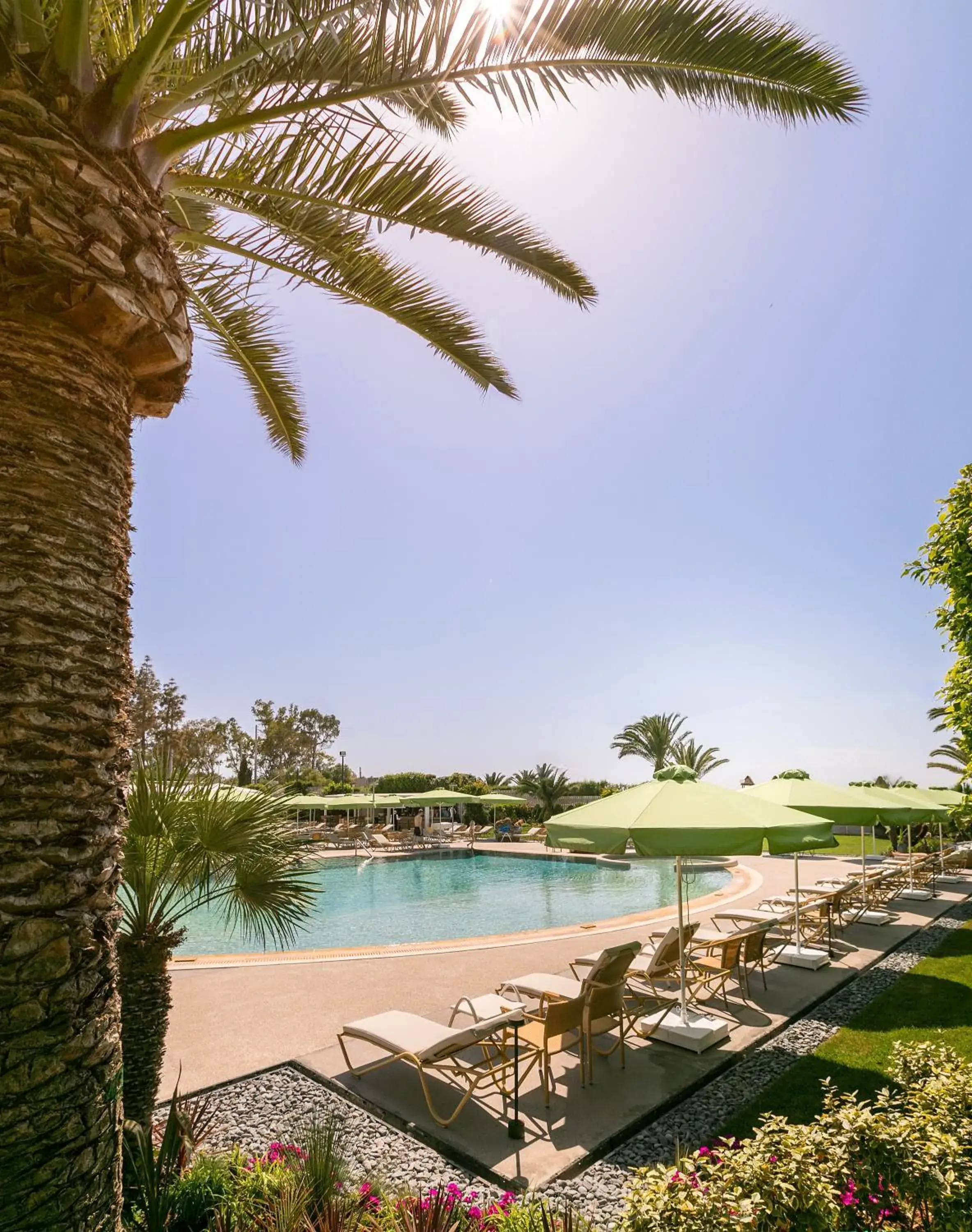 Pool view in Divani Apollon Palace & Thalasso Pool view in Divani Apollon Palace & Thalasso