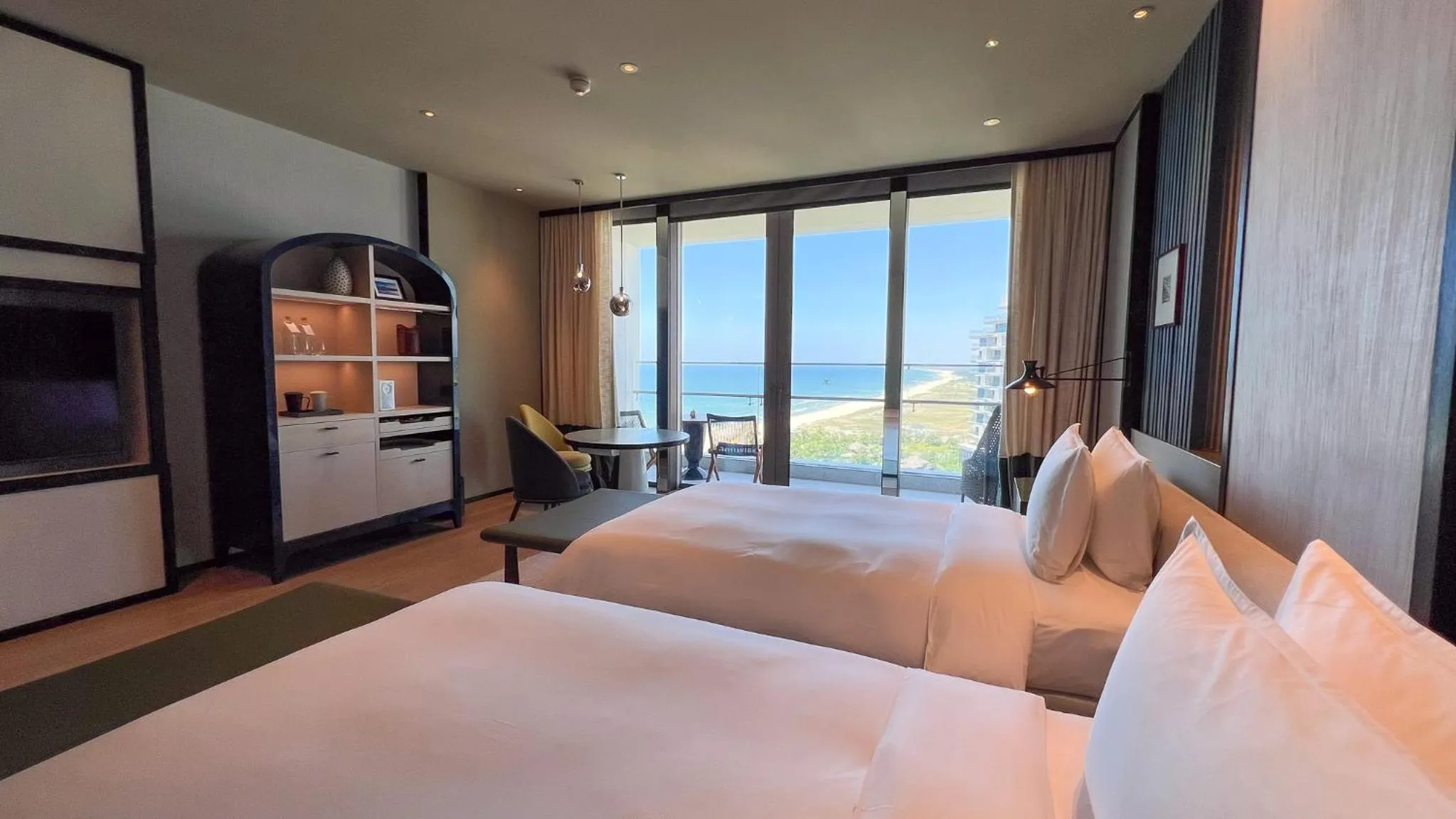 Sea view, Bed in New World Hoiana Beach Resort