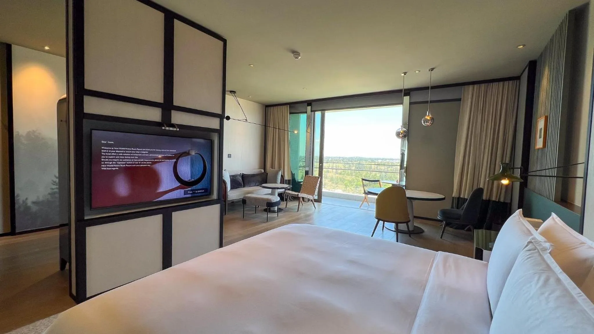 Bed in New World Hoiana Beach Resort