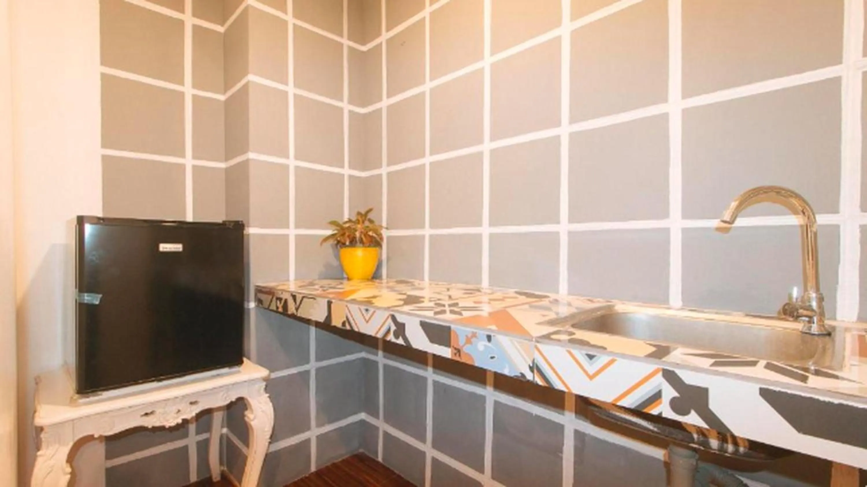 Kitchen or kitchenette in OYO 1087 Enrico's Place Kamias