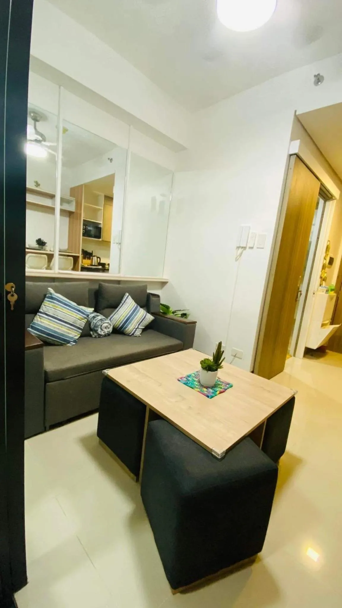 Living room in Cozy 1Br with Netflix & Balcony Pool View Condo