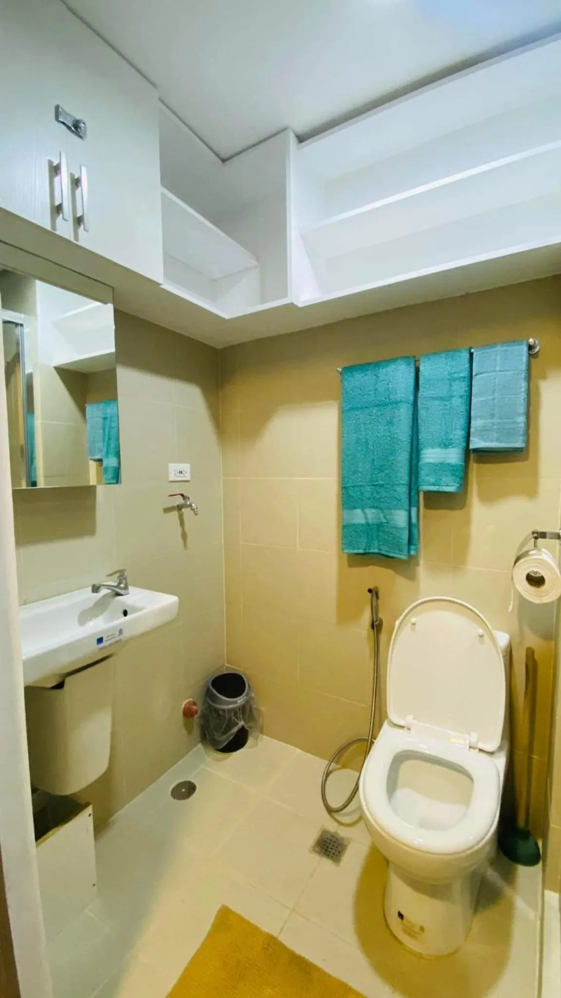 Toilet in Cozy 1Br with Netflix & Balcony Pool View Condo