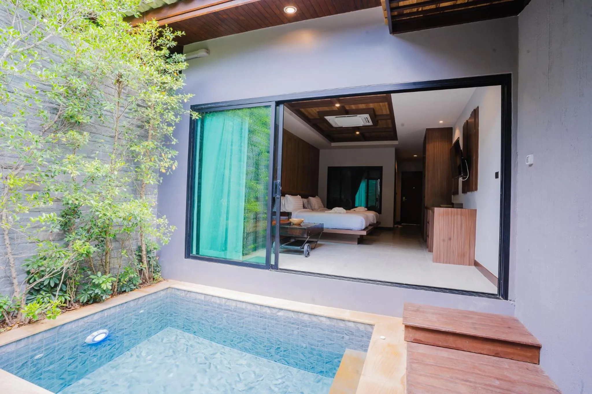 Bed in Malabar Pool Villa Phuket