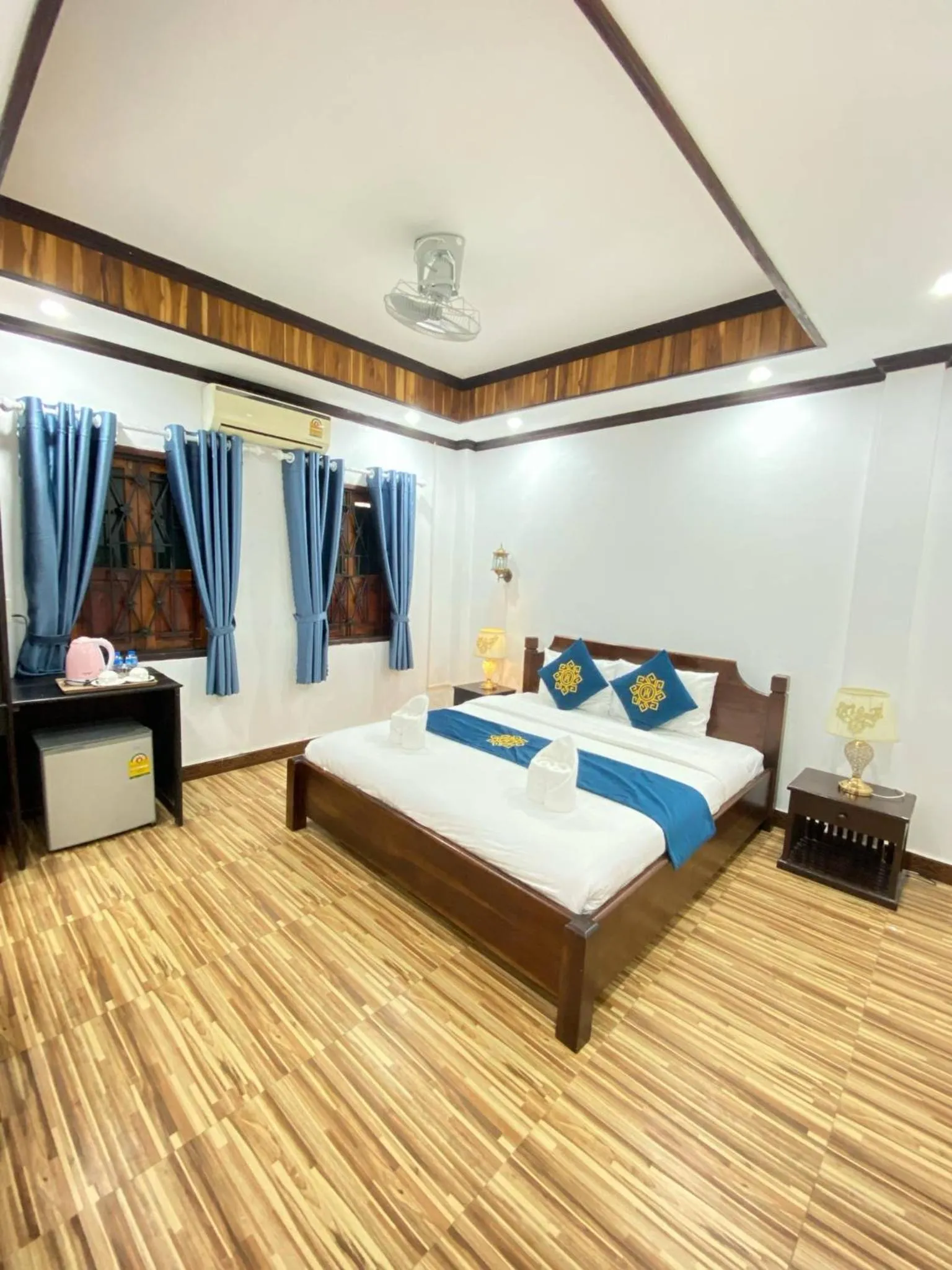 Bed in Singharat Boutique House