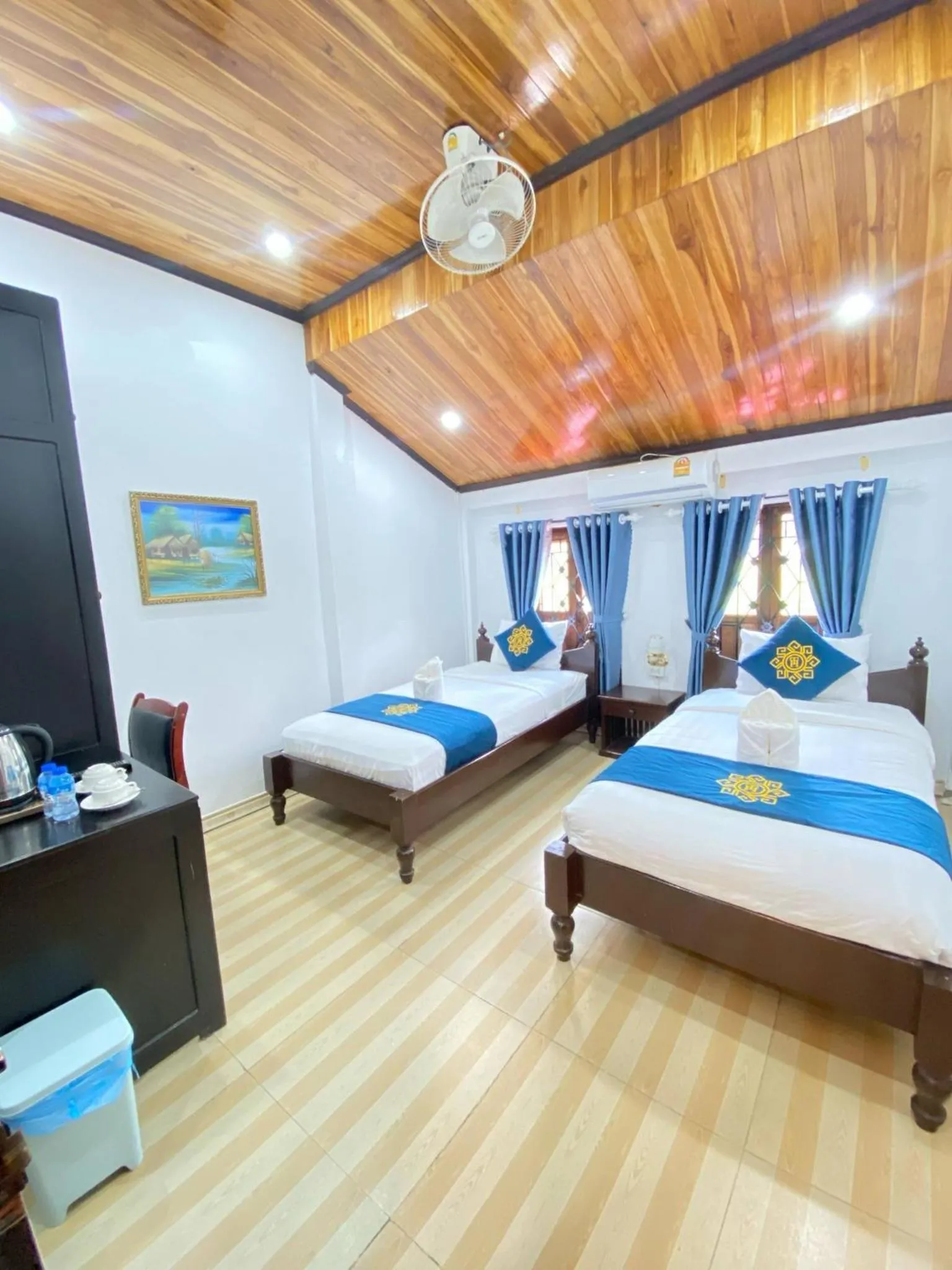 Bed in Singharat Boutique House