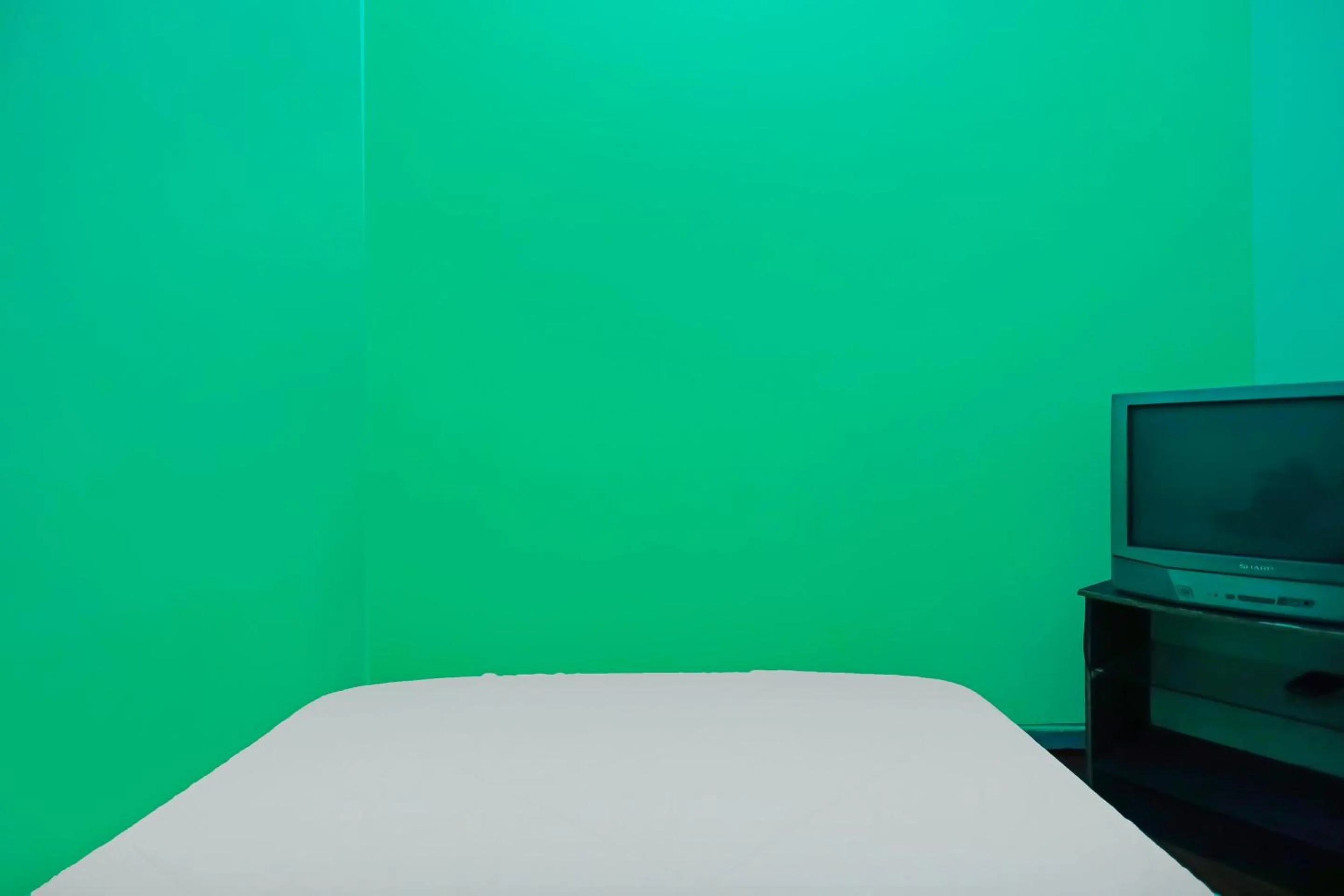 Bedroom in Hotel O Penginapan LorraNearPasar Oleh Oleh