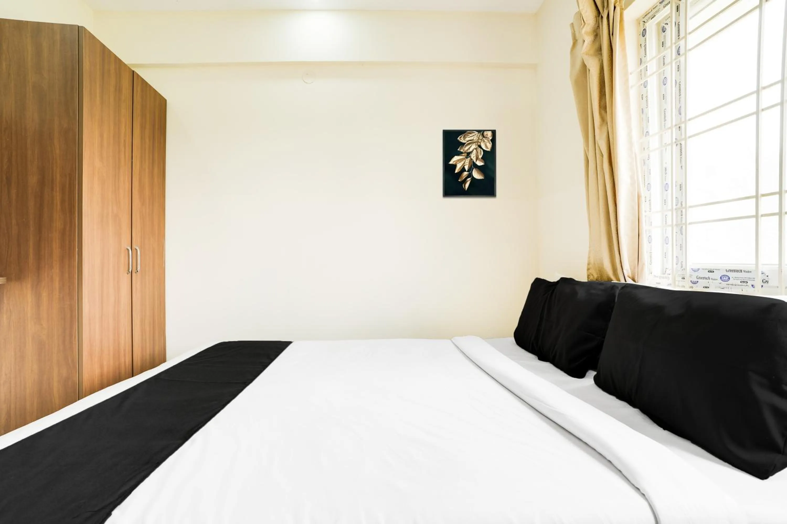 Bedroom, Bed in Super Hotel O Bangalore Near Reva Circle Formerly CKA Boarding