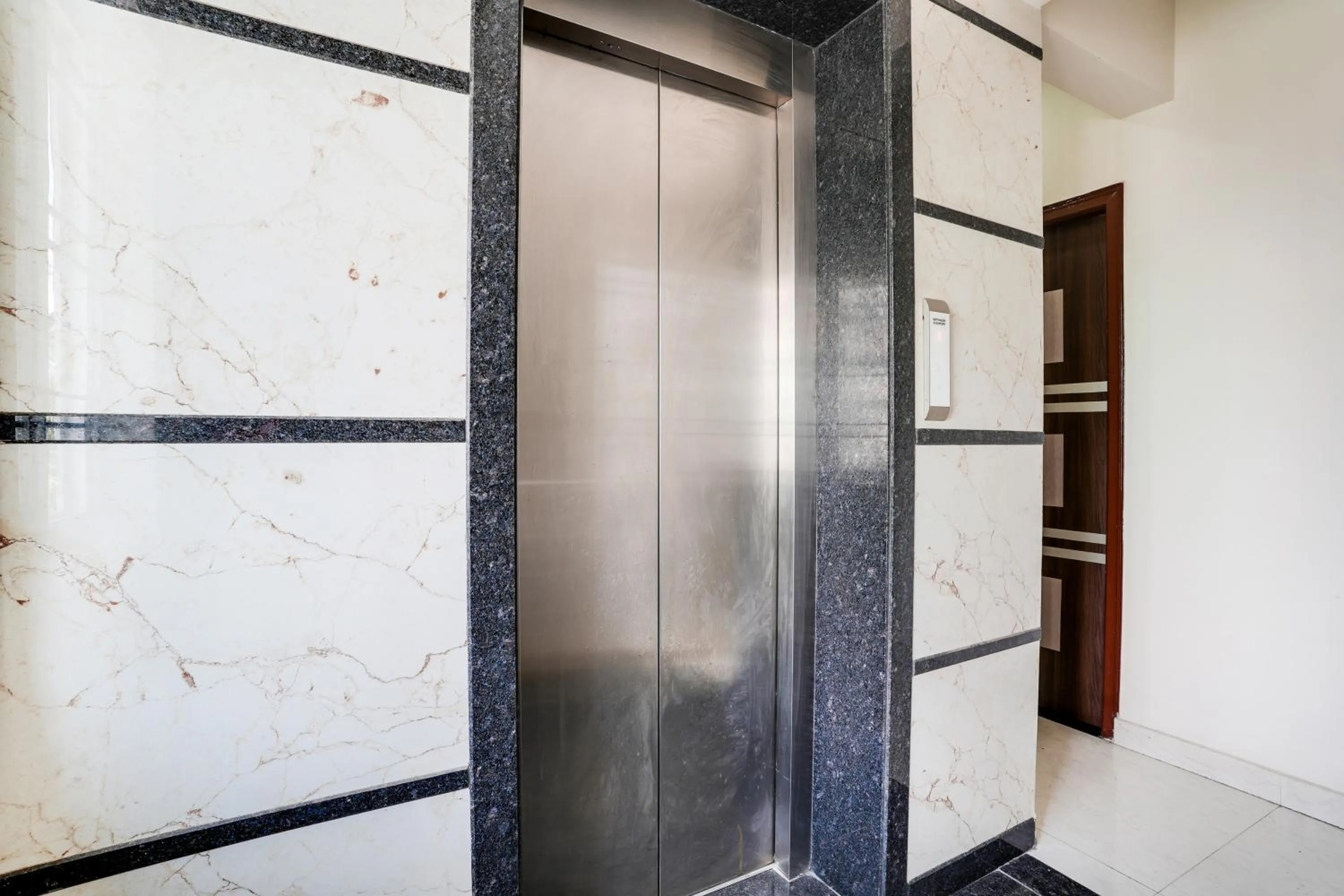 Lobby or reception in Super Hotel O Bangalore Near Reva Circle Formerly CKA Boarding