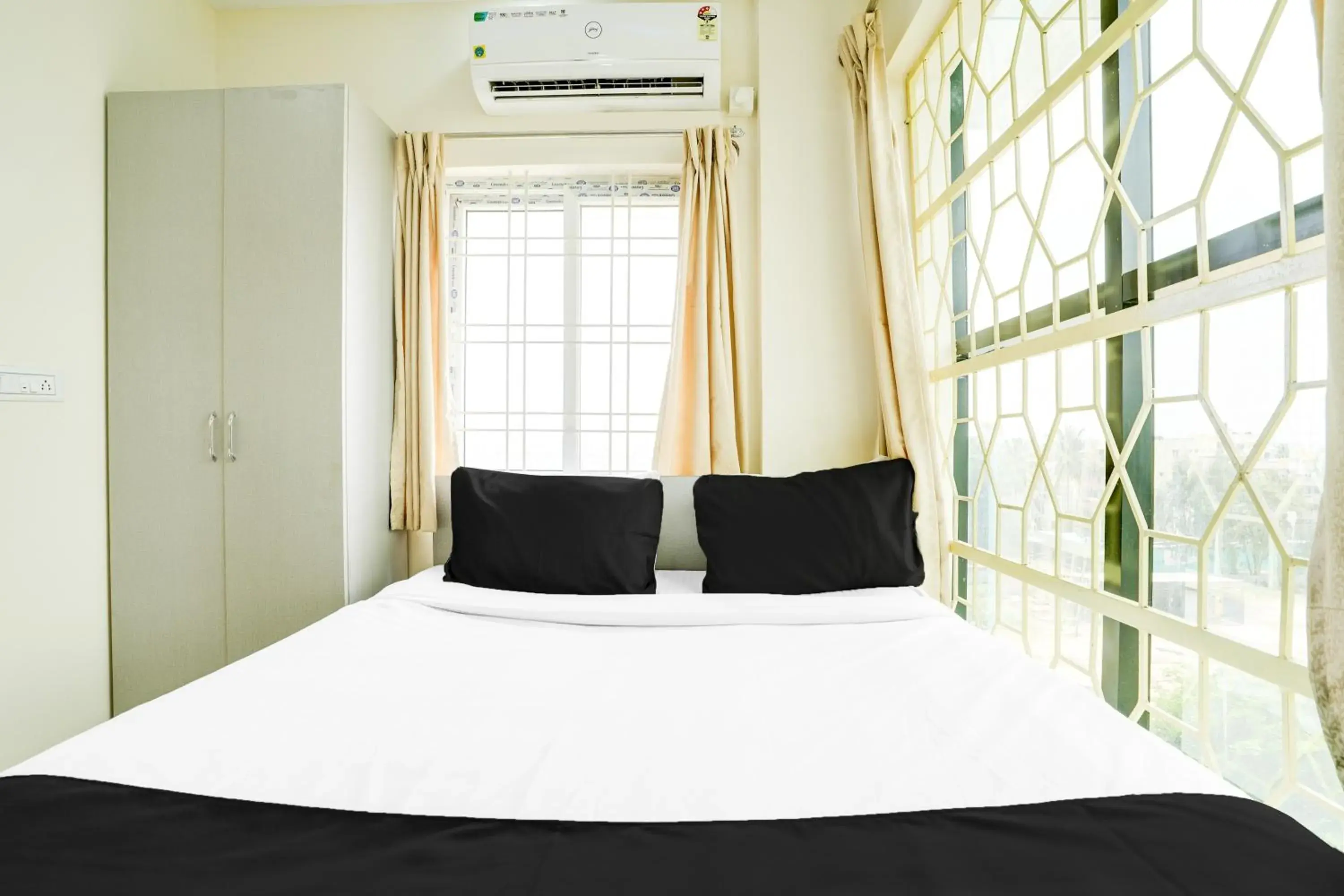 Bedroom, Bed in Hotel O Bangalore Near Reva Circle Formerly CKA Boarding Bedroom, Bed in Hotel O Bangalore Near Reva Circle Formerly CKA Boarding