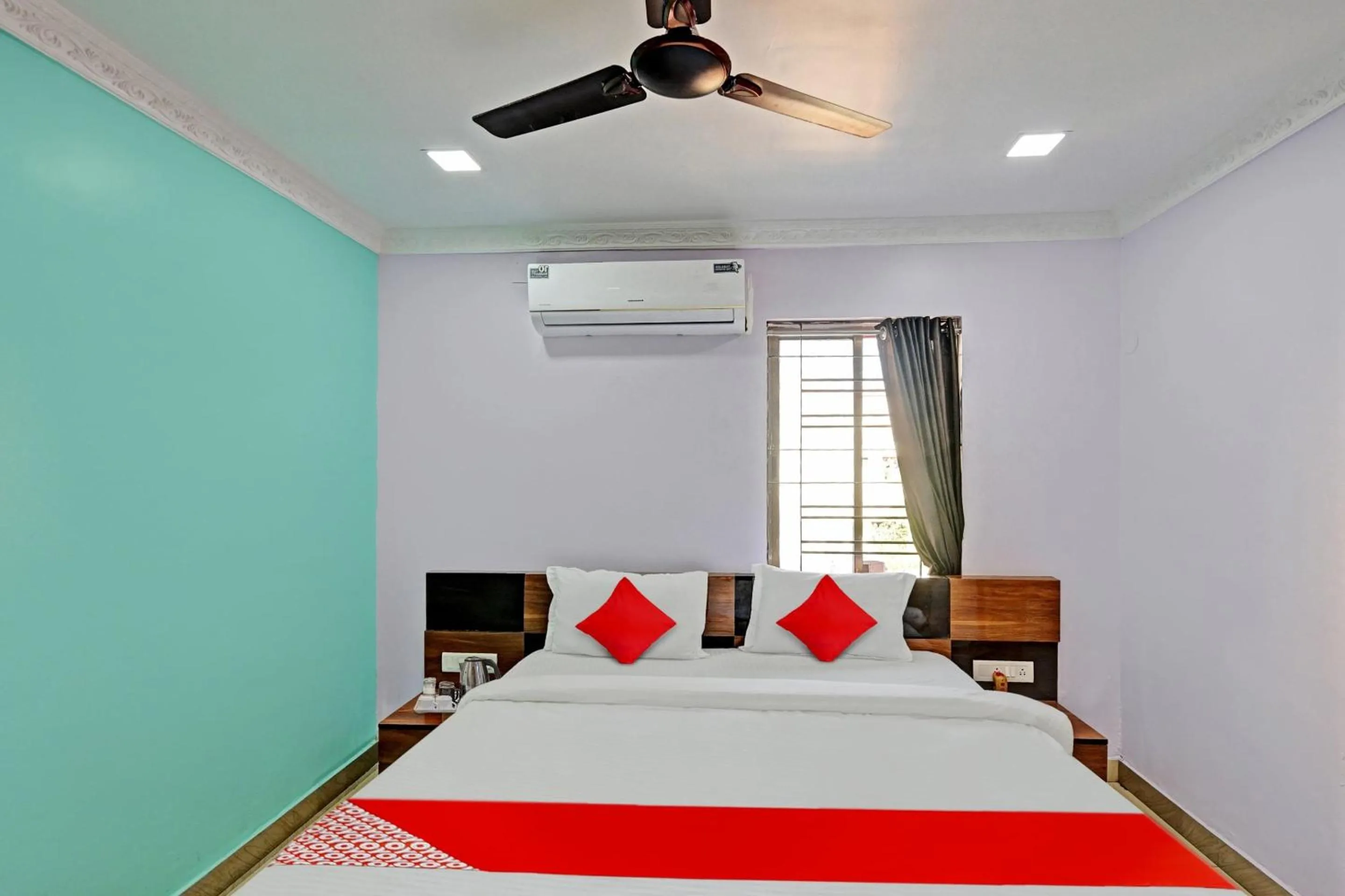 Bedroom in Hotel O Hi5 Days Inn Premium