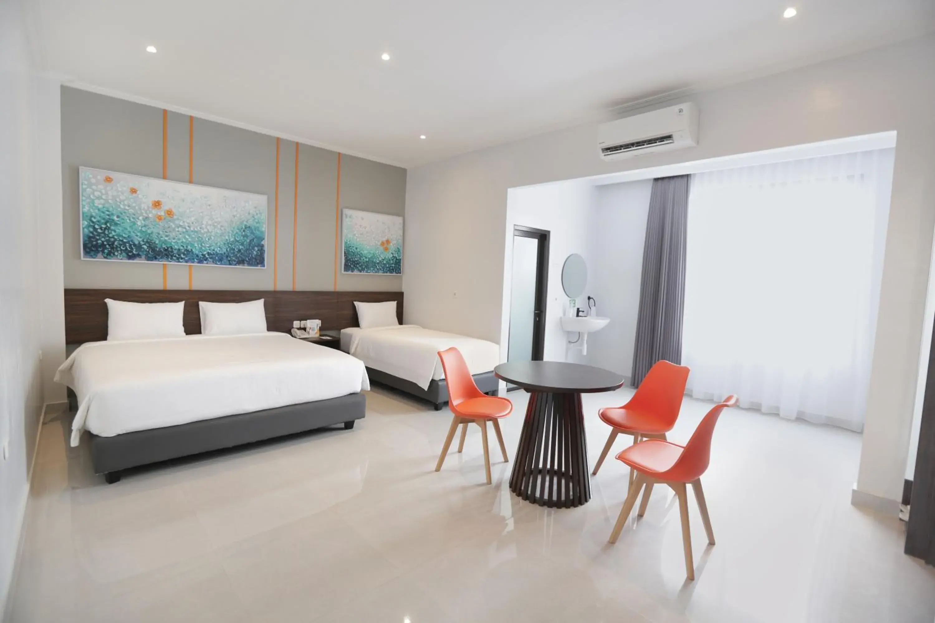 Deluxe Triple Room in Atap Biru Residence Deluxe Triple Room in Atap Biru Residence