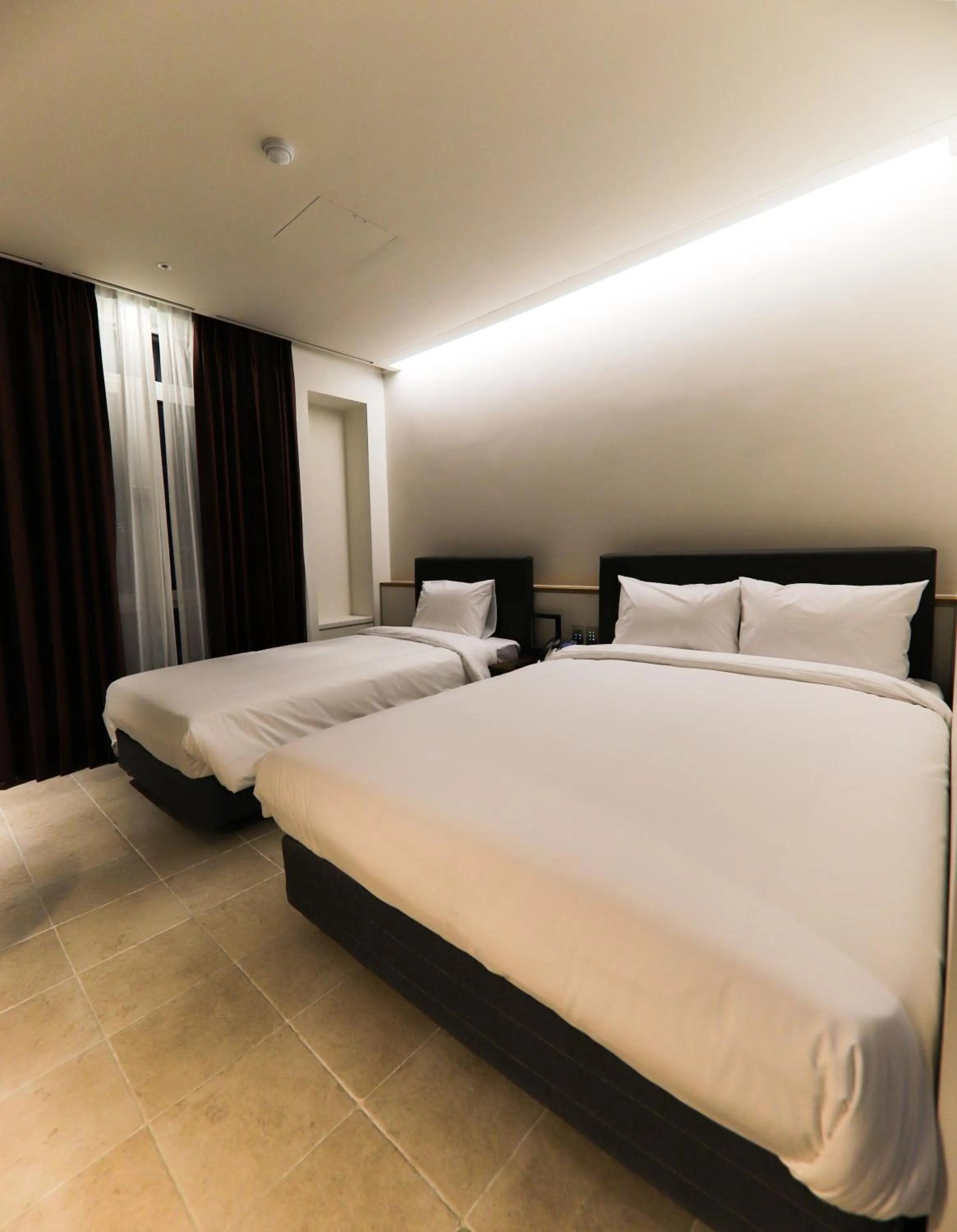 Bed in LE SEOUL HOTEL