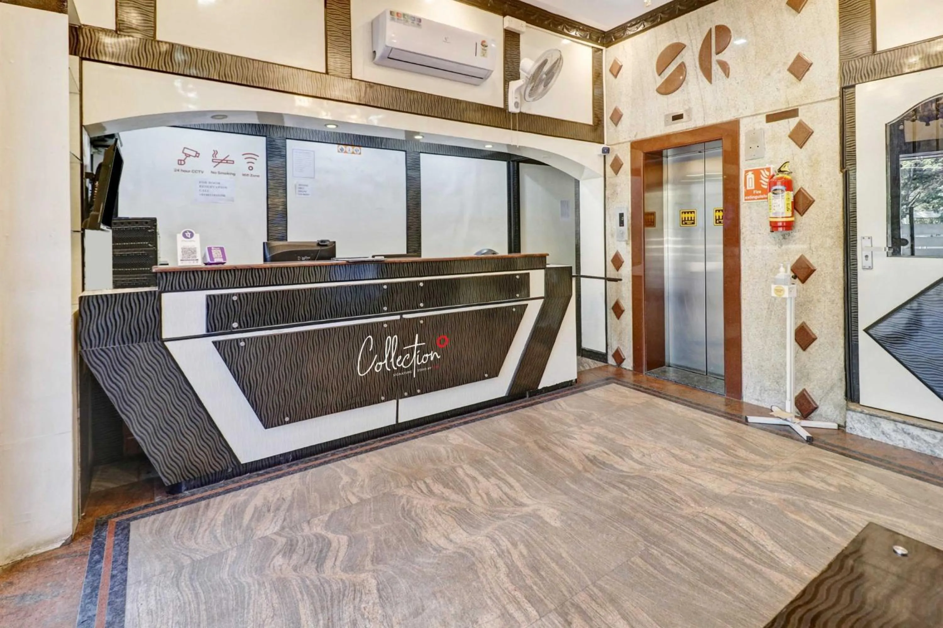 Lobby or reception in Collection O Sabharwal Residency Near Lalbagh Botanical Garden