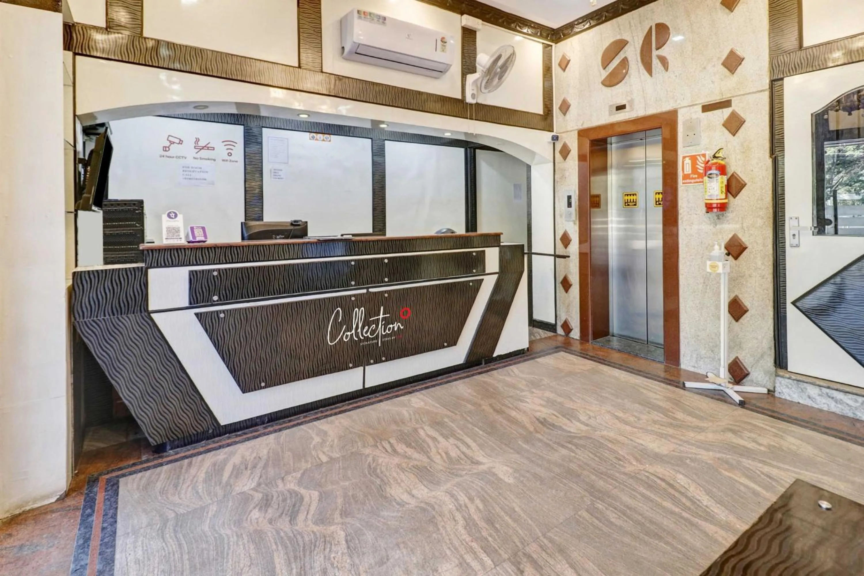 Lobby or reception in Collection O Sabharwal Residency Near Lalbagh Botanical Garden