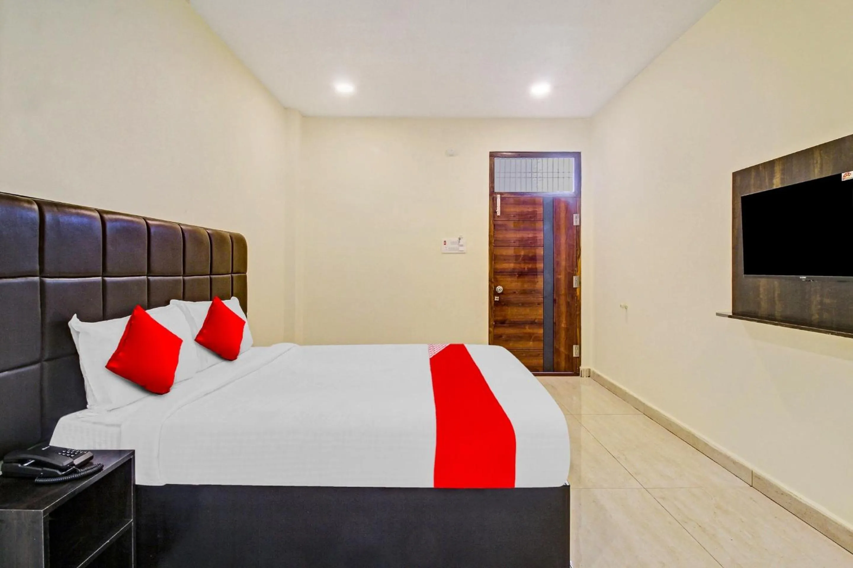 Bedroom in Super Hotel O Lakshmi Royal Inn