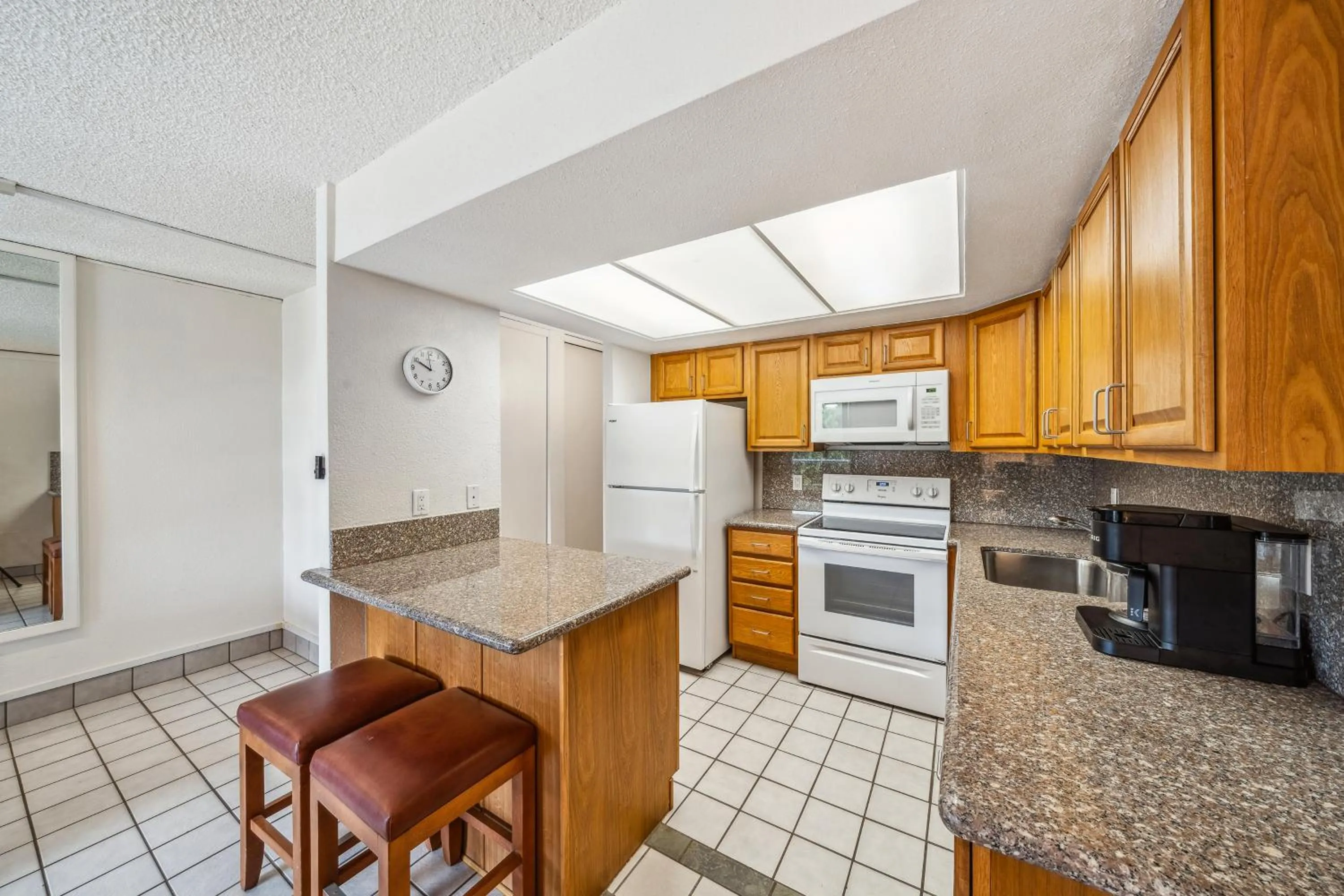 Kitchen or kitchenette in Maui Schooner Resort