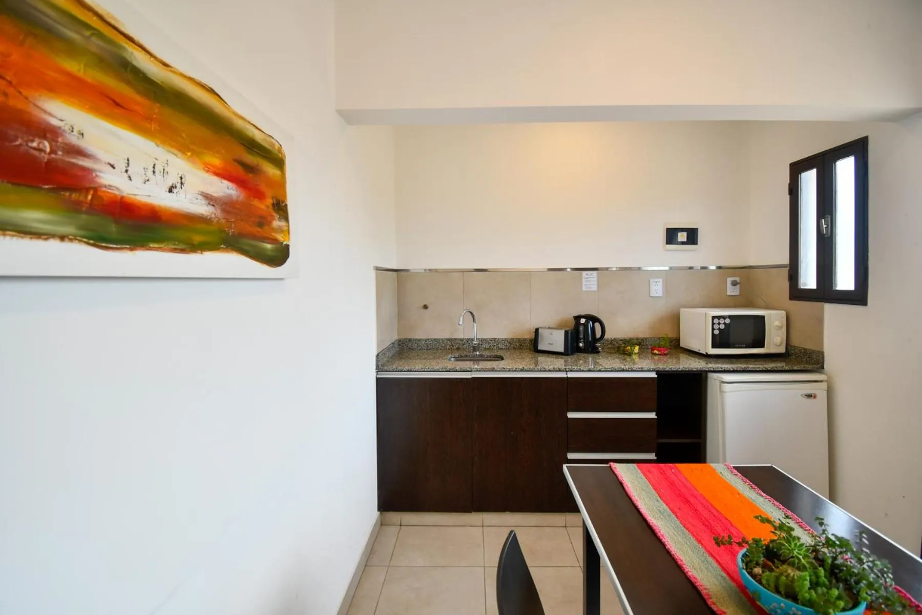 Kitchen or kitchenette in Ref Apart & Hotel
