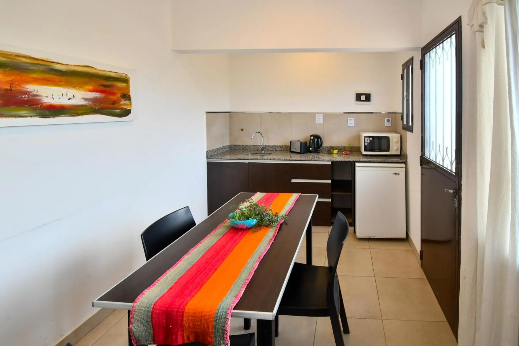 Kitchen or kitchenette in Ref Apart & Hotel