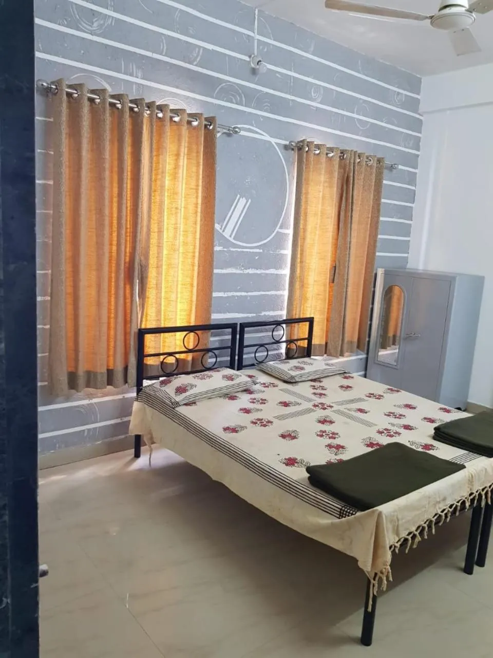 Photo of the whole room, Bed in Om Shree Yatri Niwas