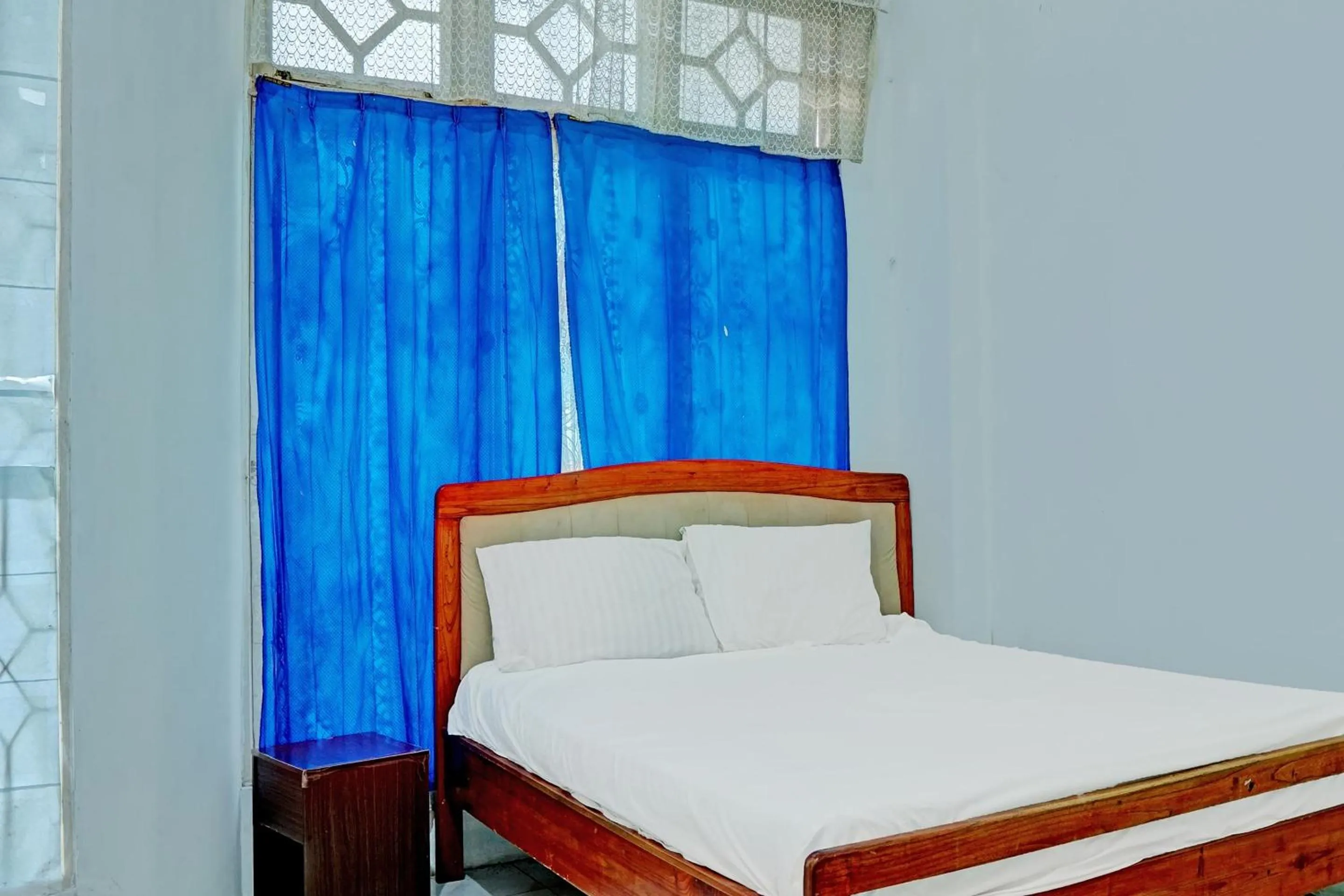 Bedroom, Bed in Hotel O Kost Axcel