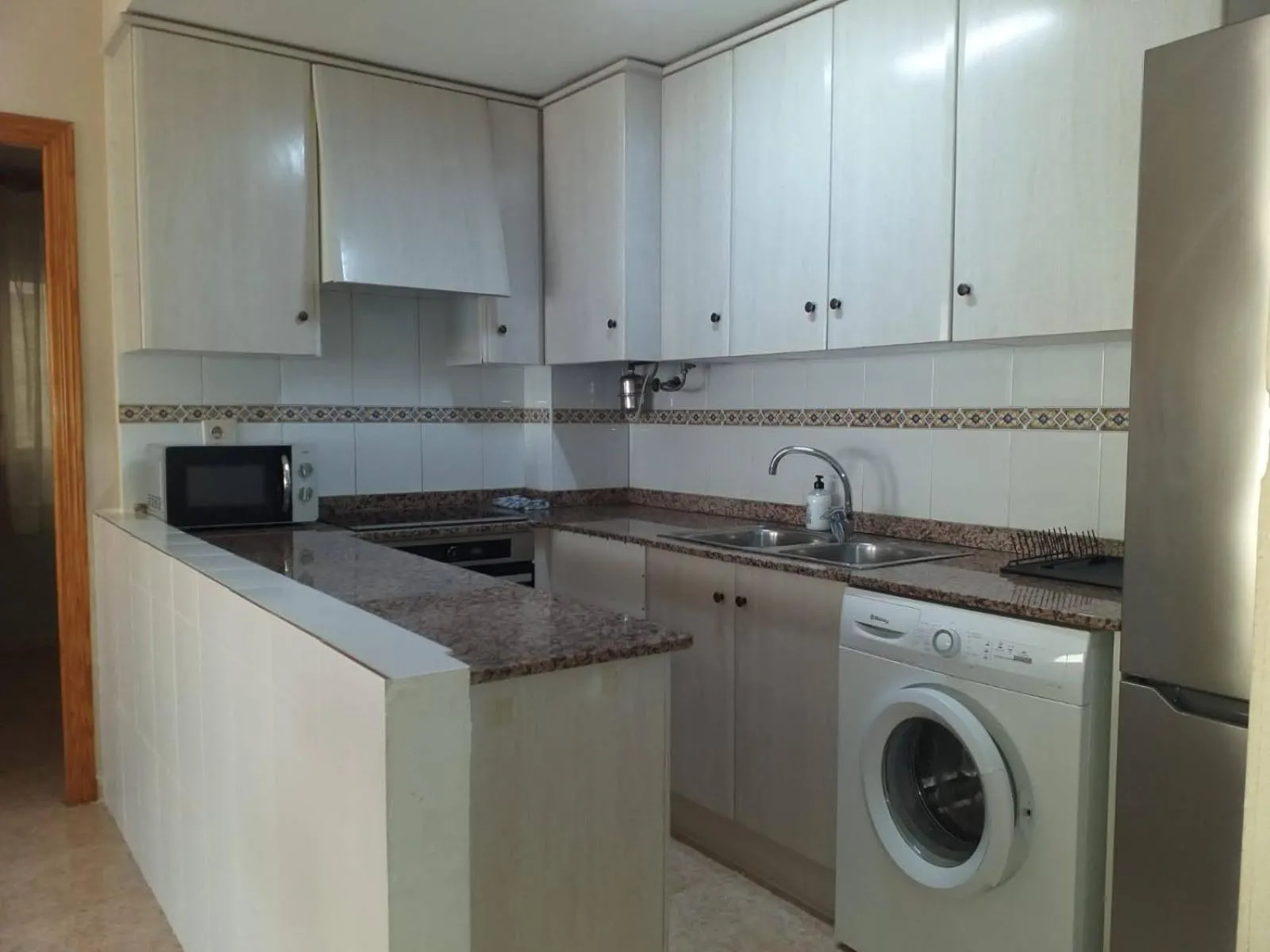 kitchen in Playa Paradís - Primera linea de playa - AP-7 3min - Self check-in 24h