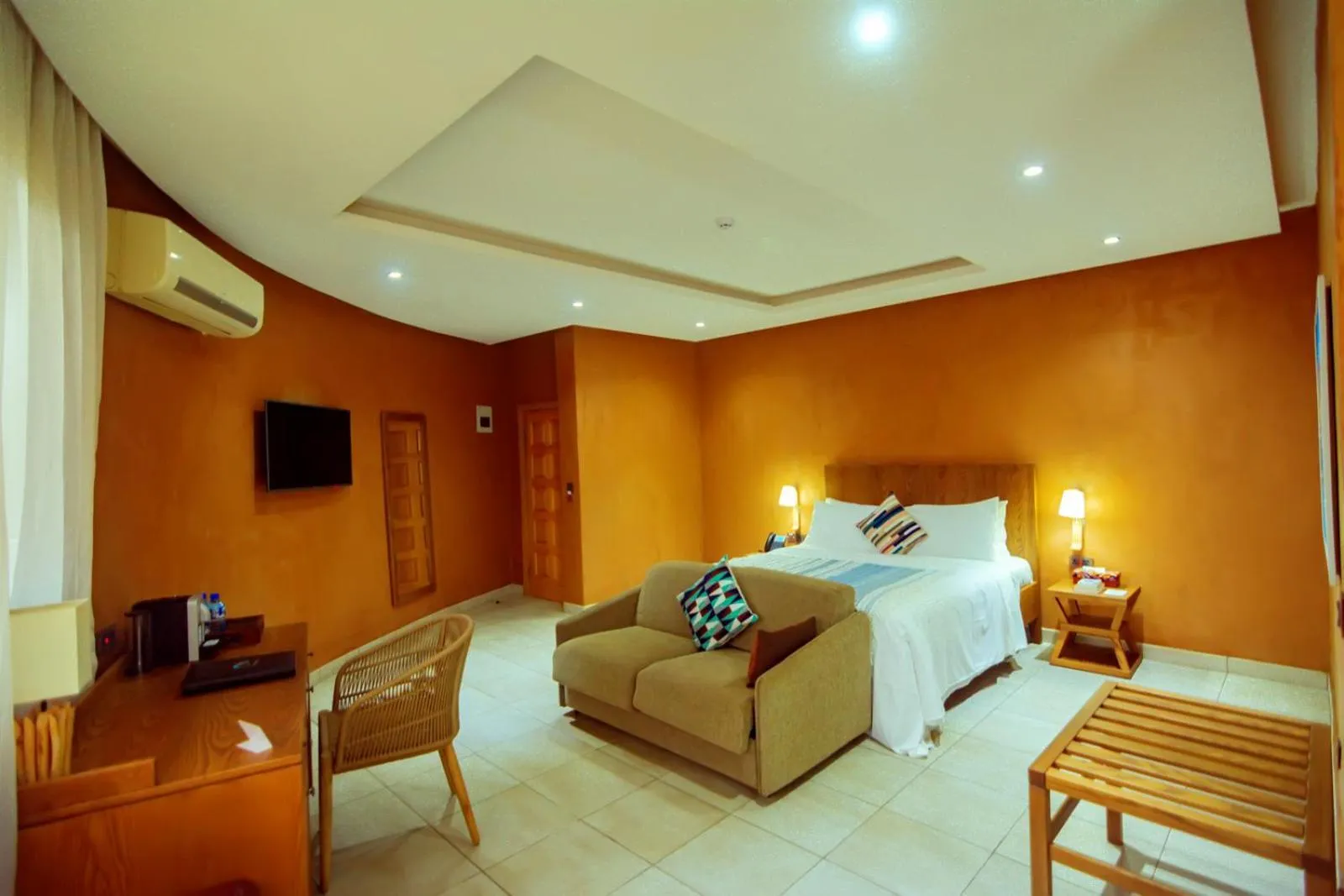 Bedroom in Trois Ore Residences & Green Earth Bistro