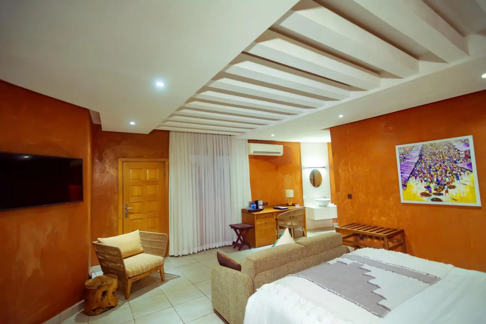 Bedroom in Trois Ore Residences & Green Earth Bistro