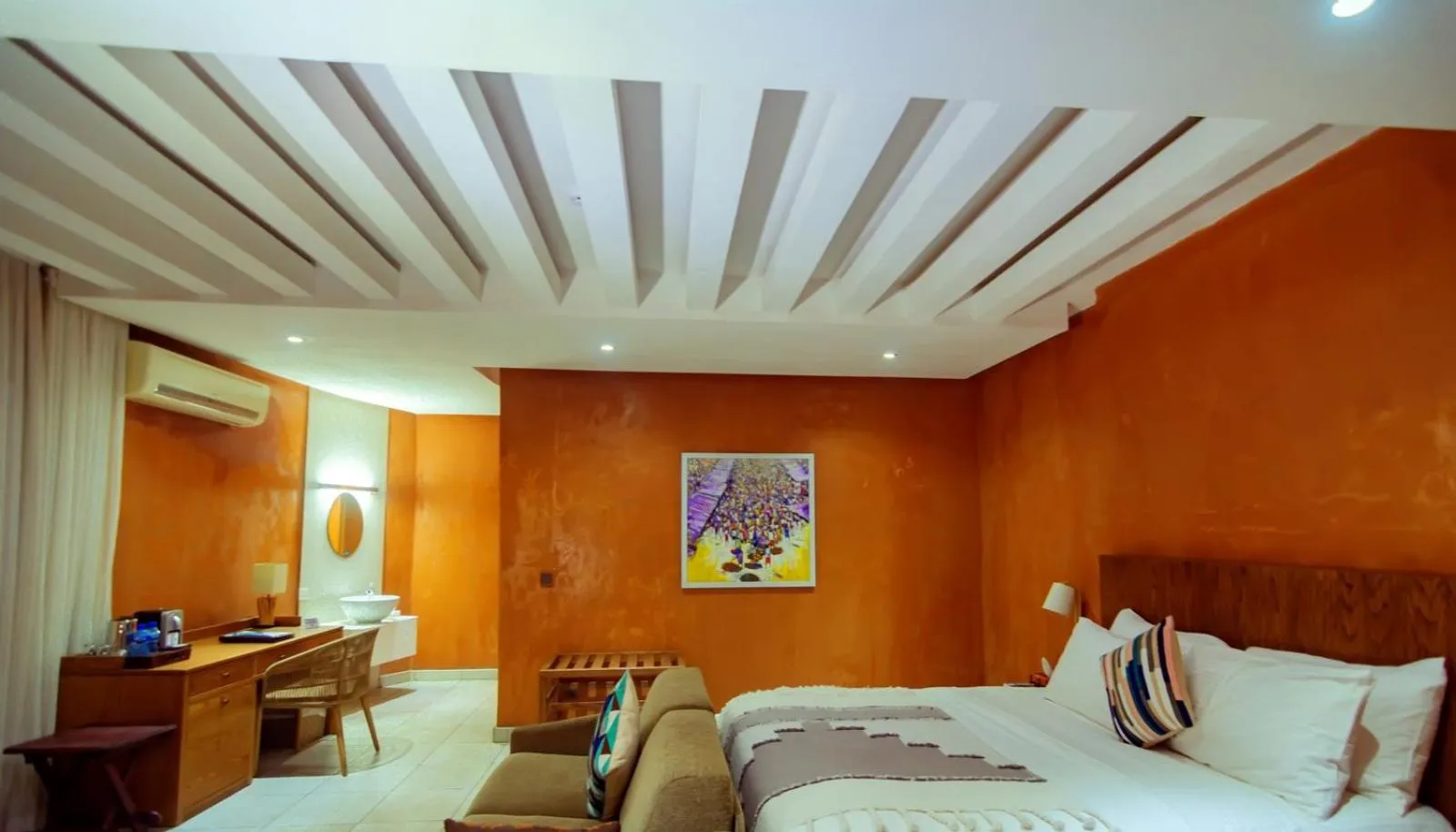 Bed in Trois Ore Residences & Green Earth Bistro