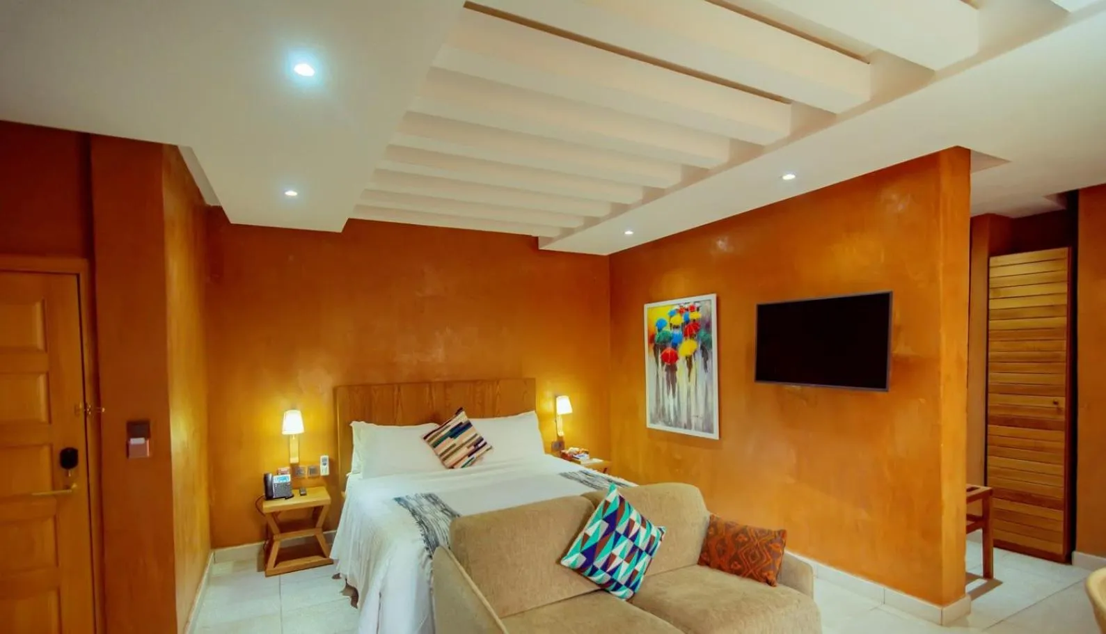 Bed in Trois Ore Residences & Green Earth Bistro