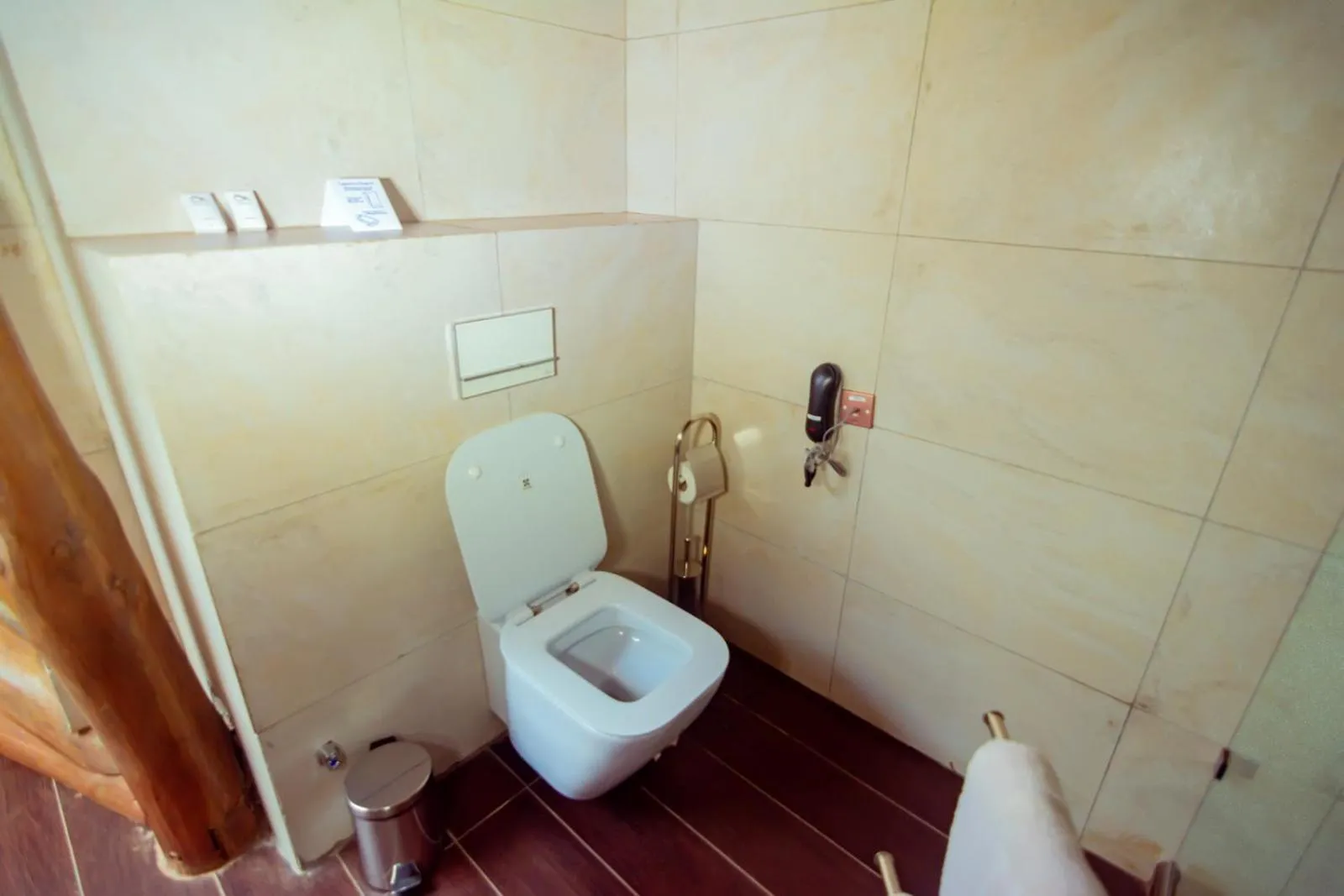 Toilet in Trois Ore Residences & Green Earth Bistro