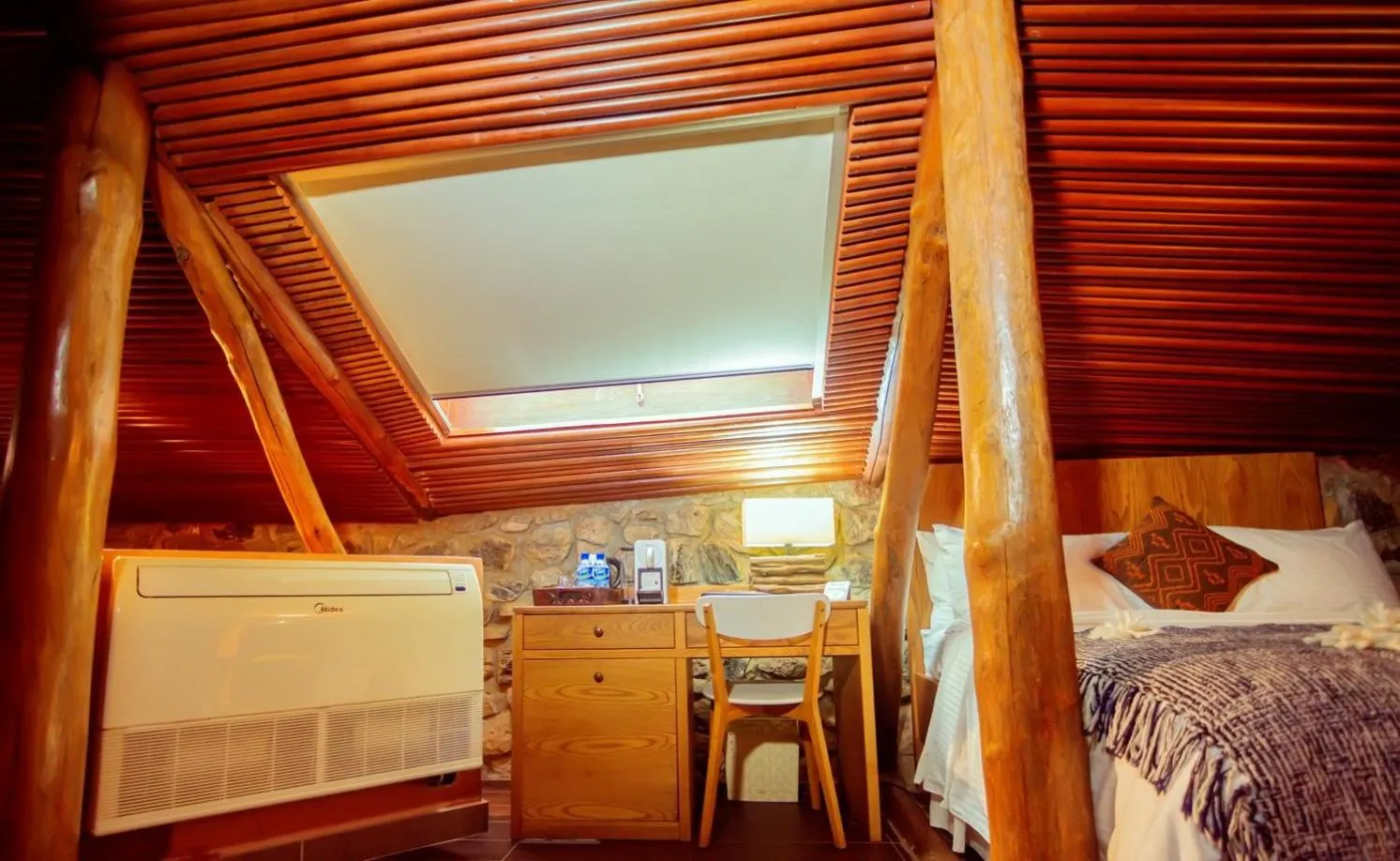 Bed in Trois Ore Residences & Green Earth Bistro