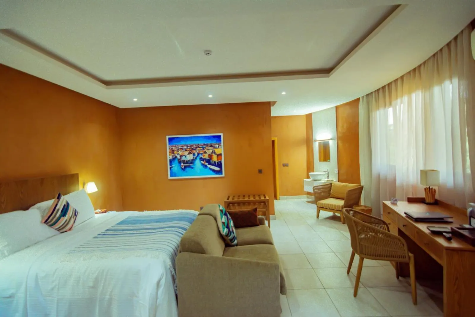 Bedroom in Trois Ore Residences & Green Earth Bistro