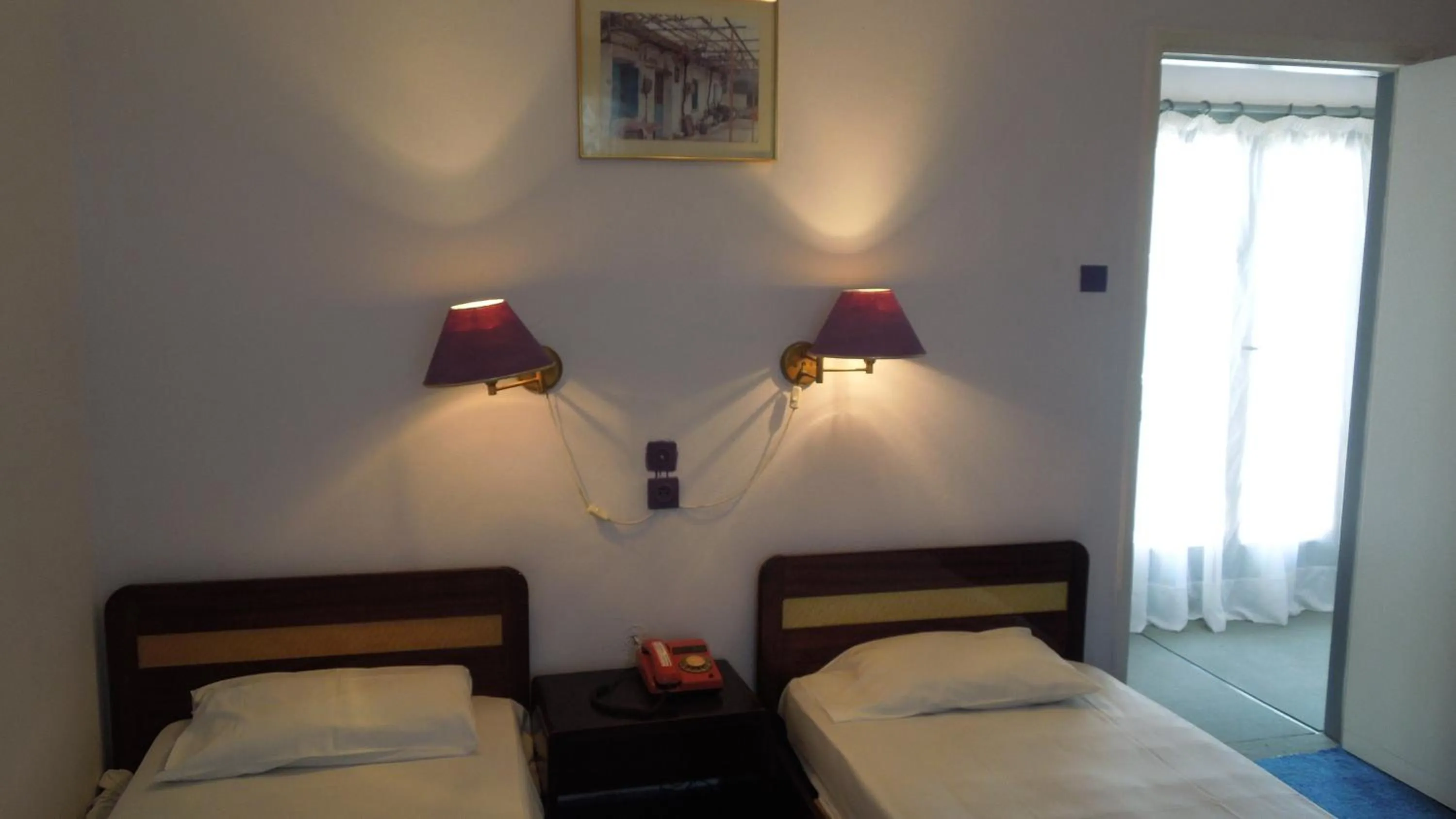 Bedroom in Miramare Hotel