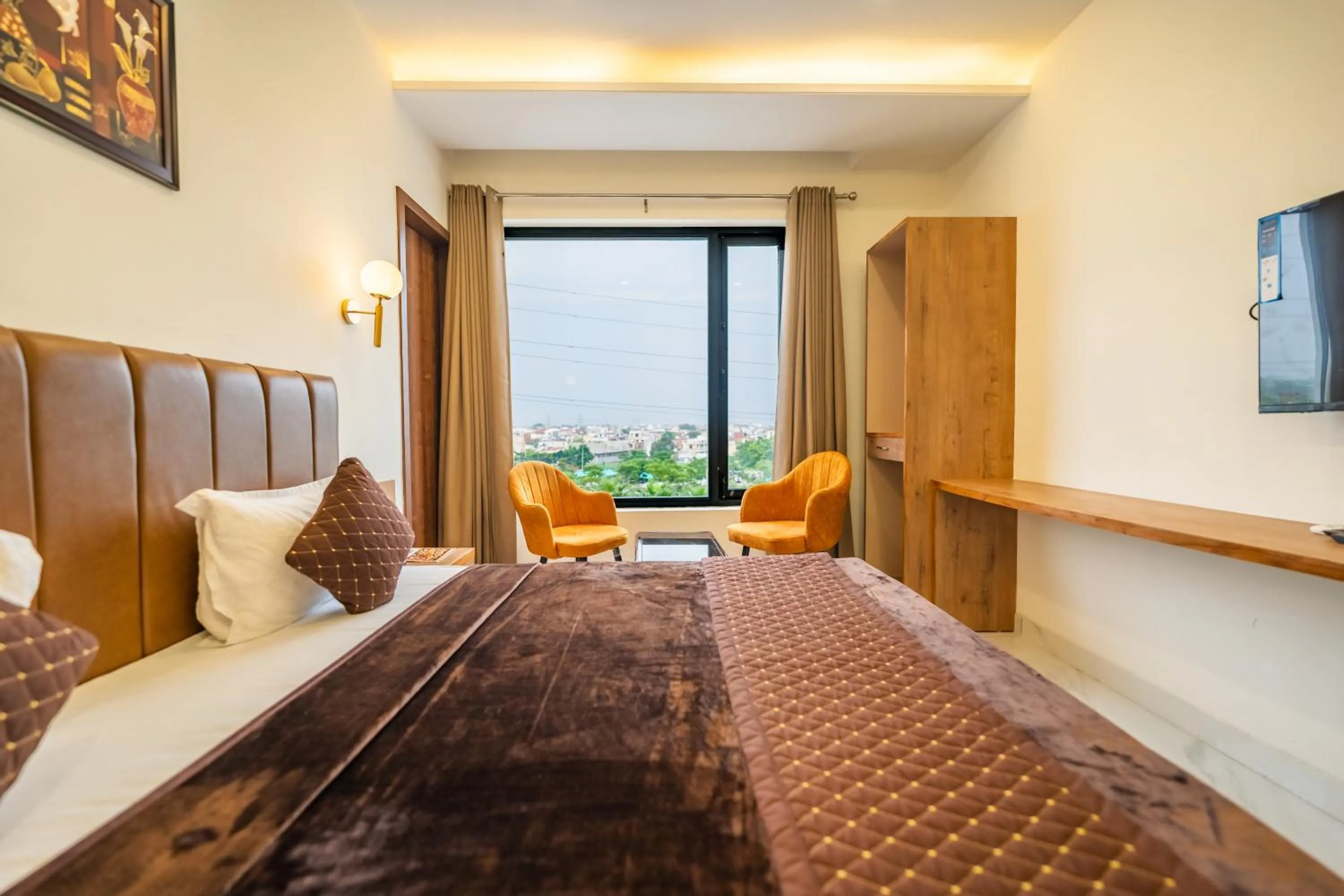 Communal lounge/ TV room, Bed in Hotel Park Hills