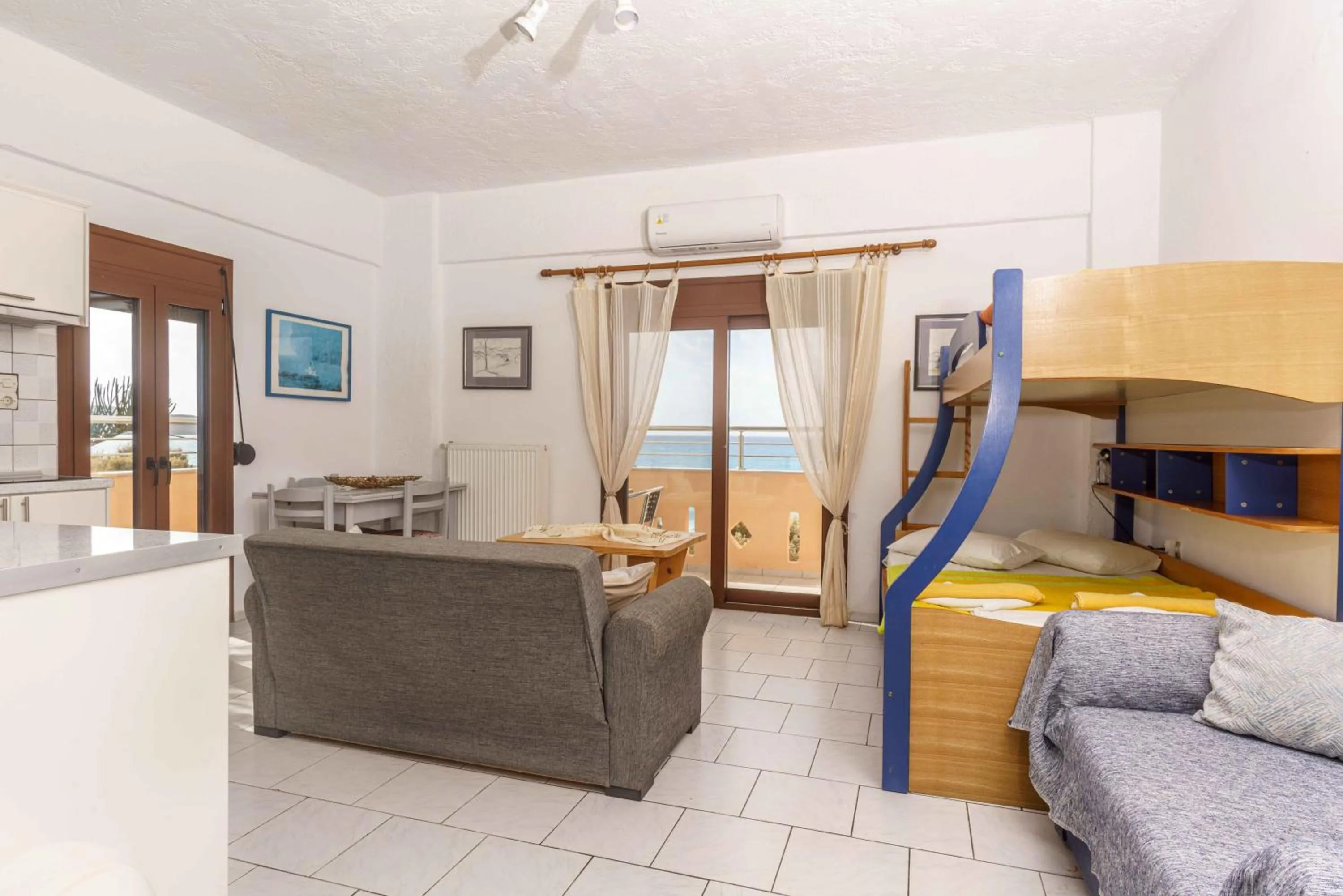 Seating area, Bed in Alexander Beach Hotel