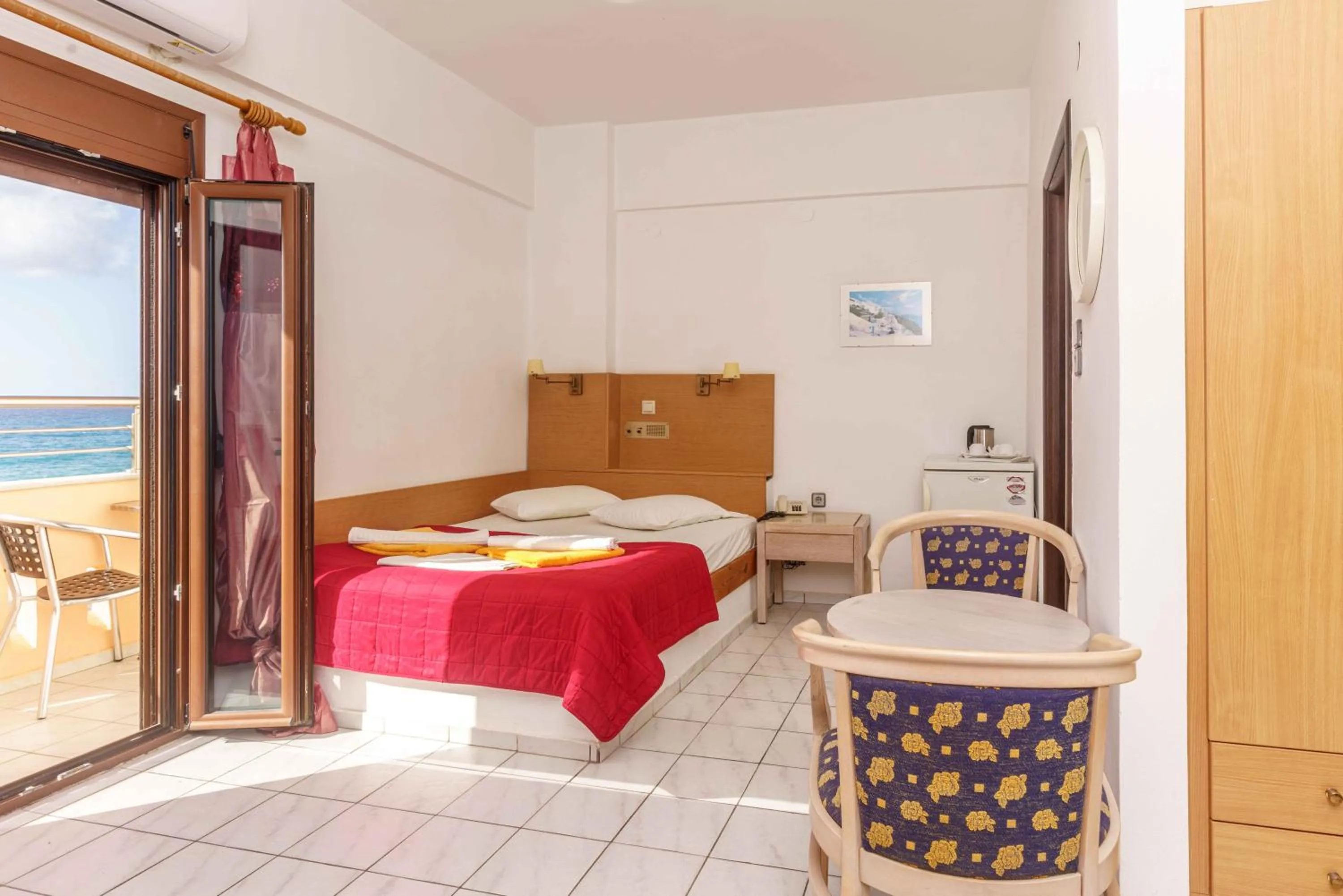 Bed in Alexander Beach Hotel