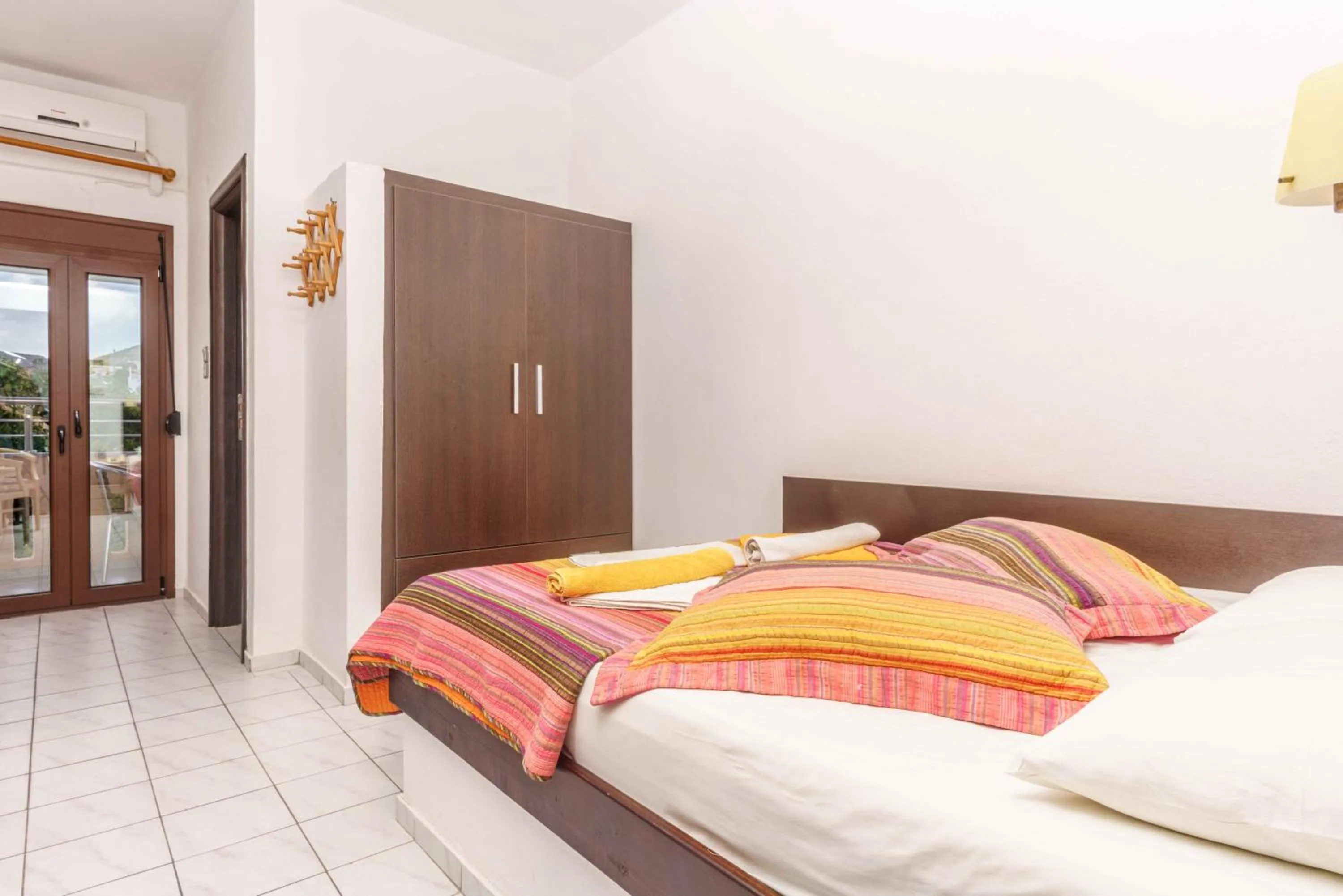 wardrobe, Bed in Alexander Beach Hotel