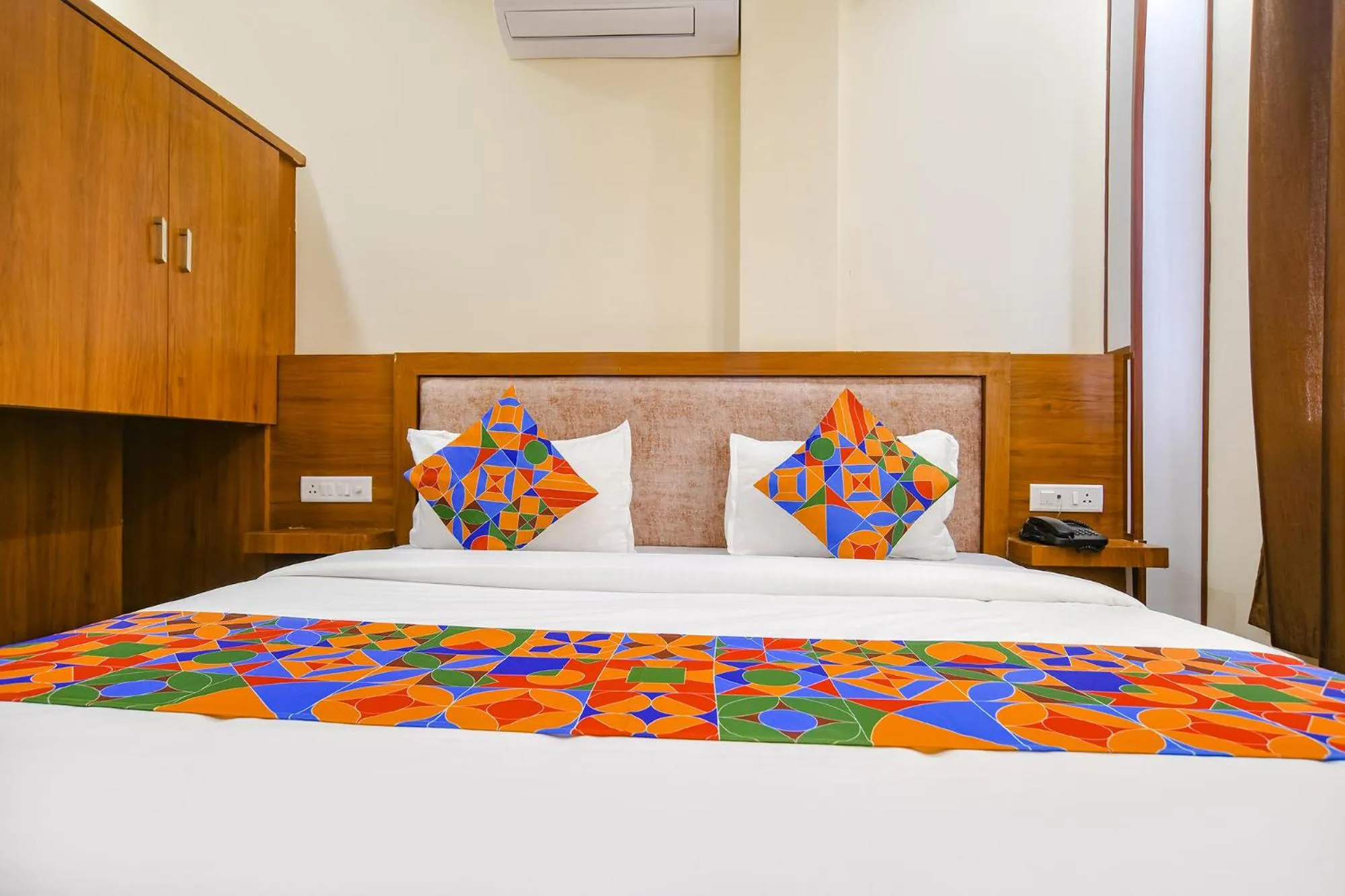 Bed in FabHotel Atharv