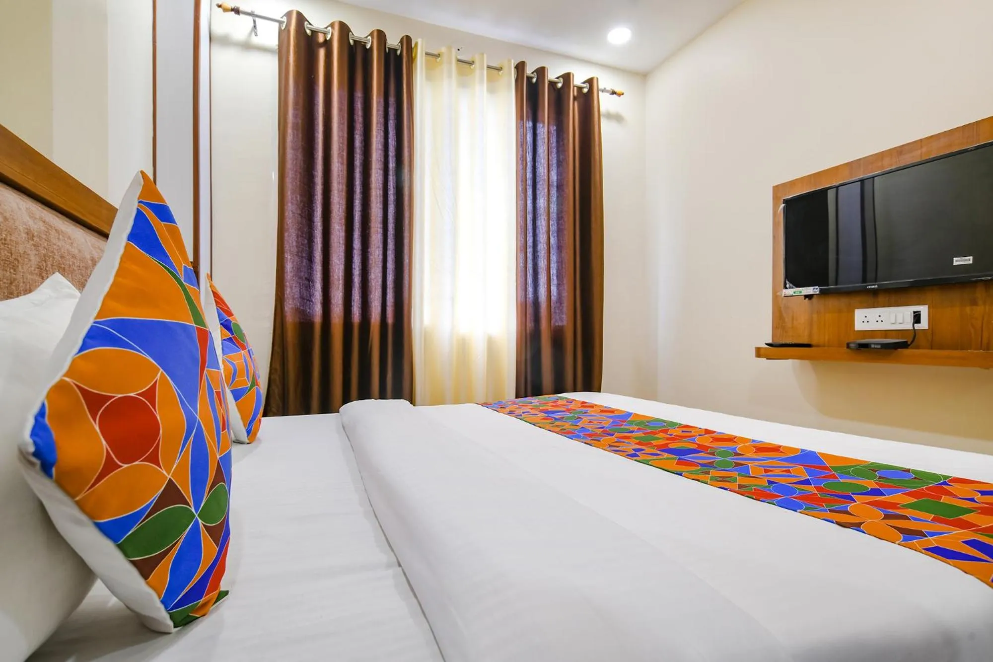 Bed in FabHotel Atharv