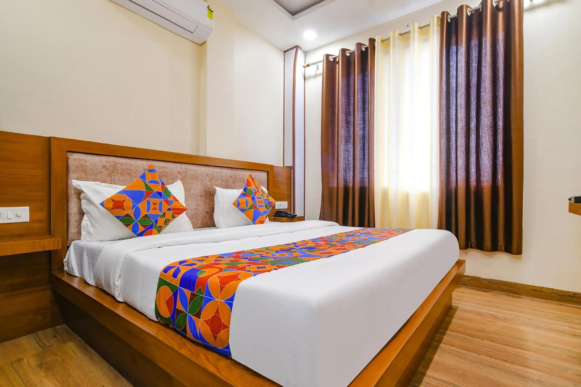 Bed in FabHotel Atharv