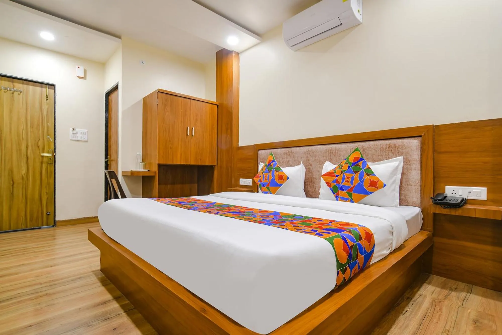 Bed in FabHotel Atharv