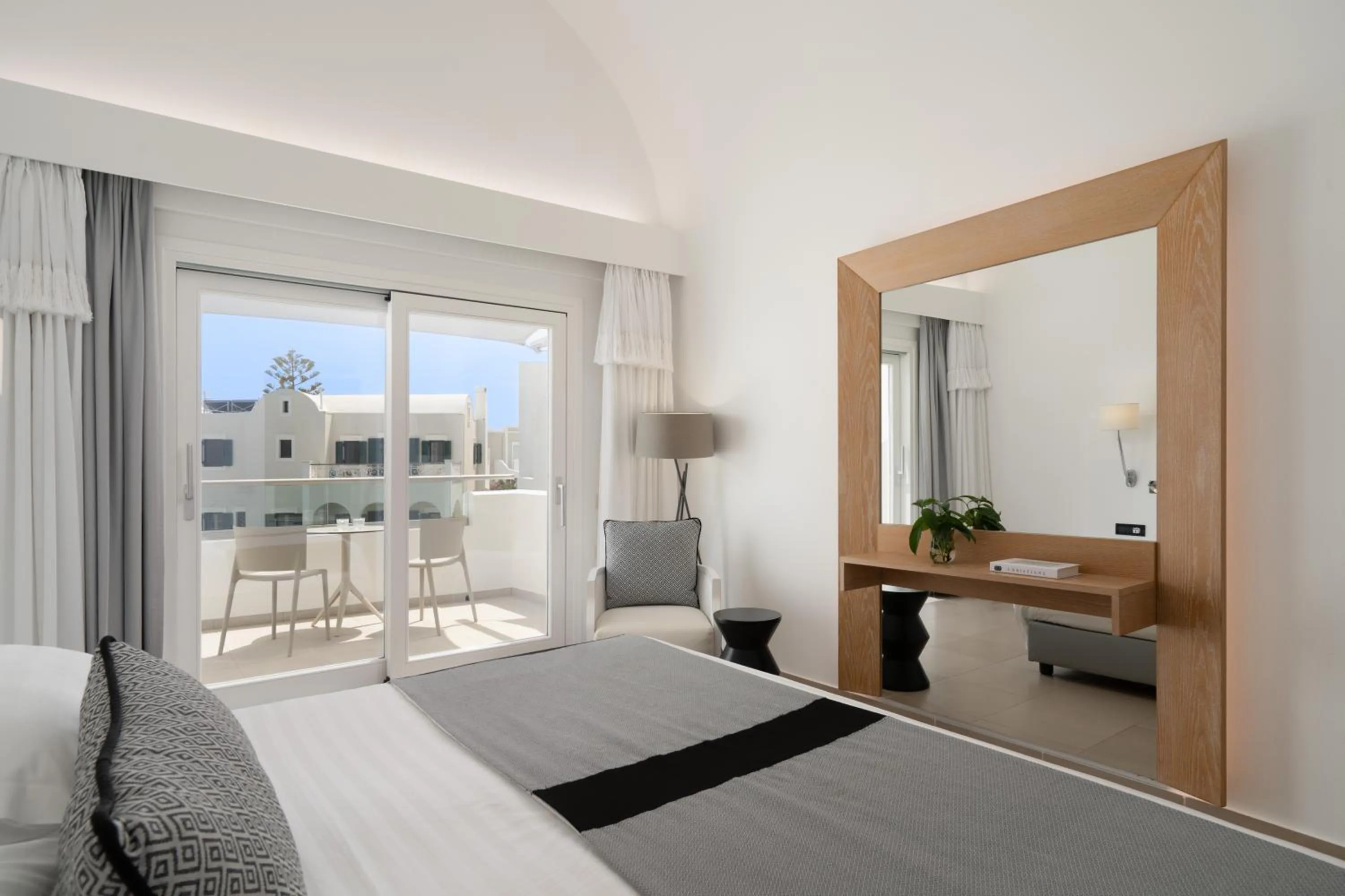 Bed in Aressana Spa Hotel & Suites - Small Luxury Hotels of the World