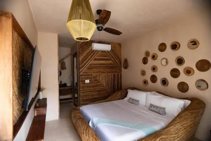 Bed in CervecerIa Tulum Boutique Hotel & Beer Spa