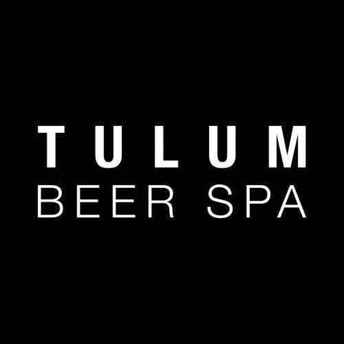 Property logo or sign in CervecerIa Tulum Boutique Hotel & Beer Spa