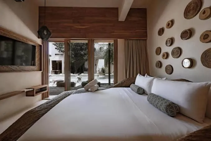 Bed in CervecerIa Tulum Boutique Hotel & Beer Spa