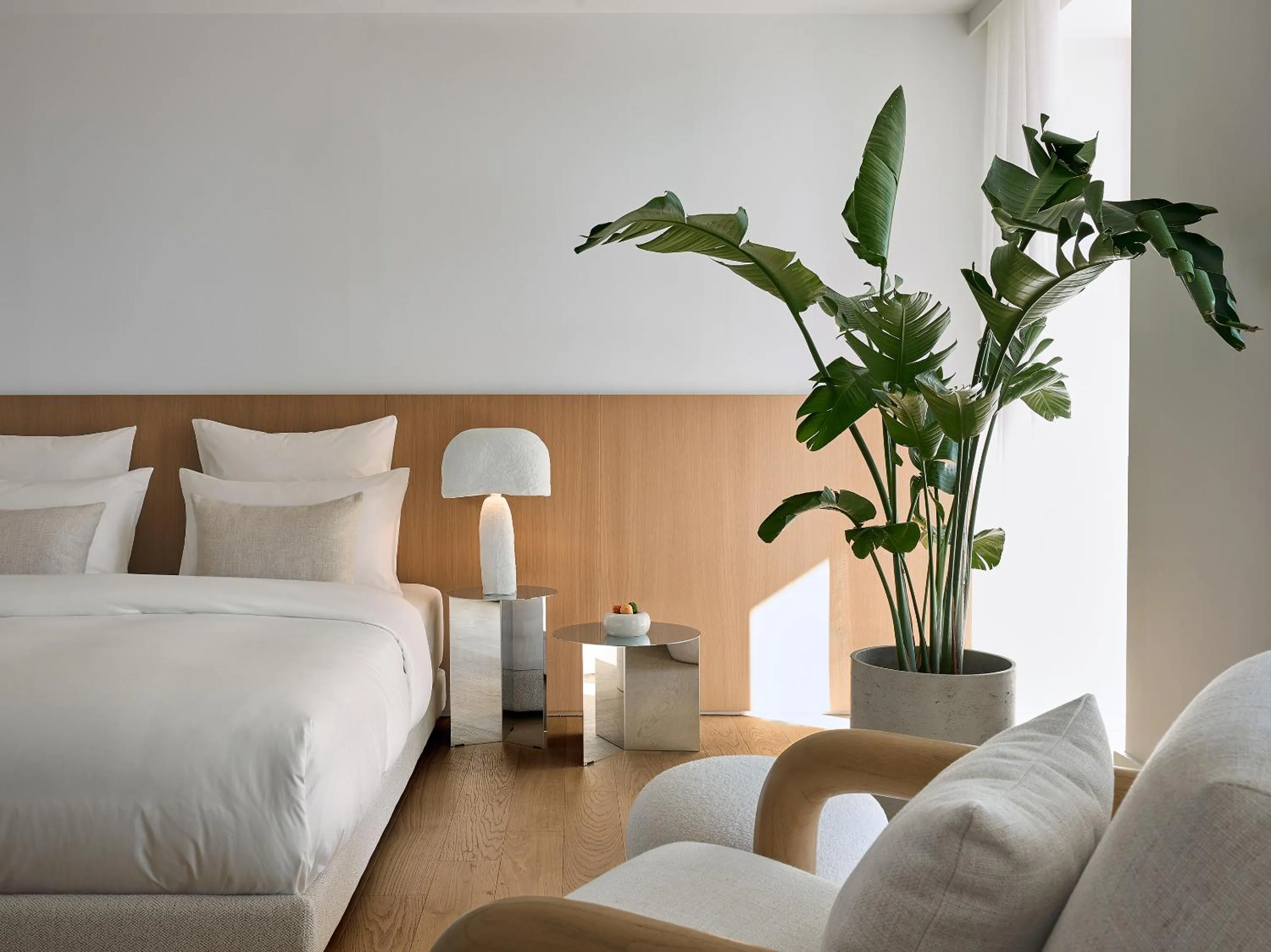 Bed in Vouliagmeni Suites