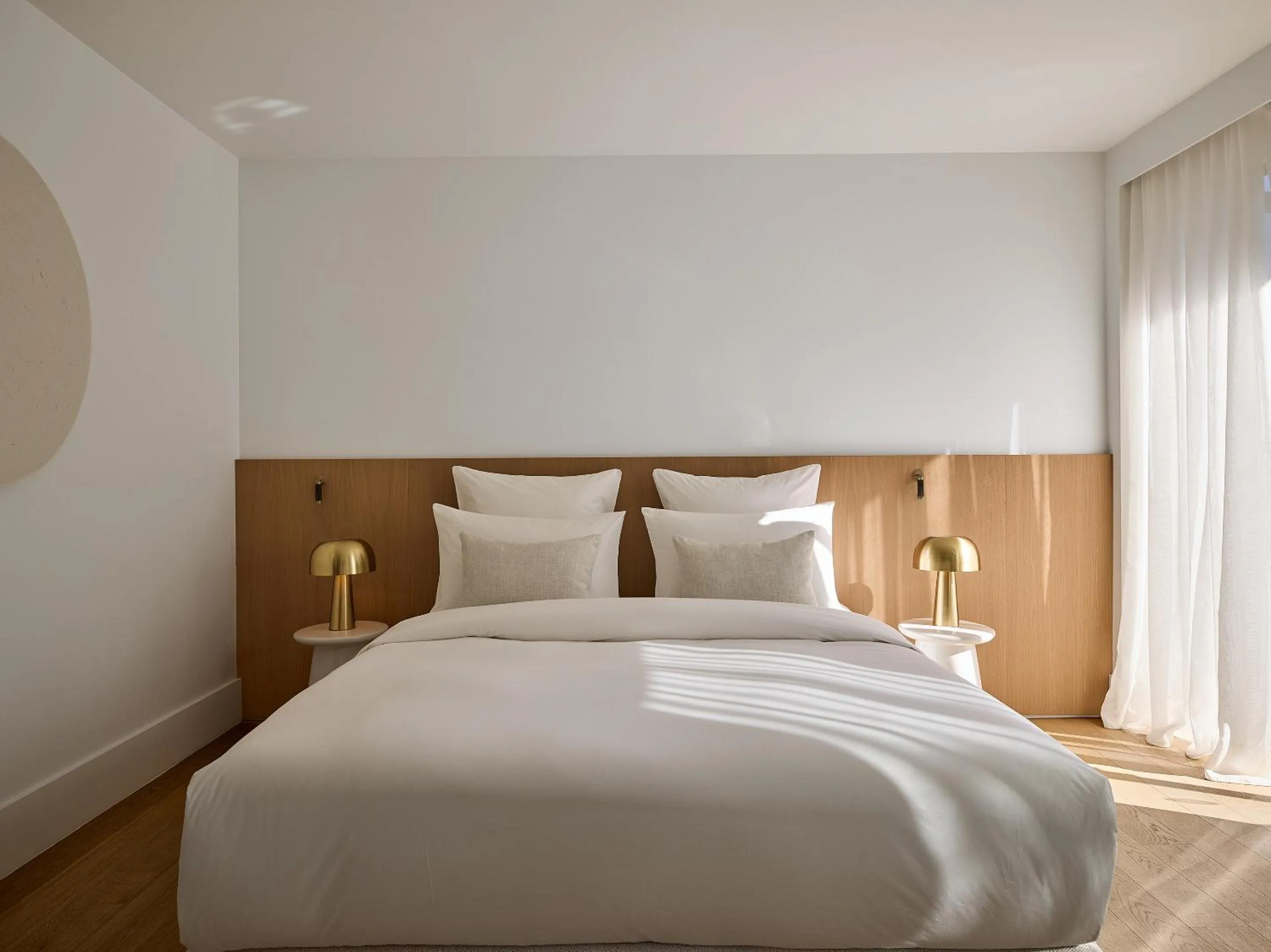 Bed in Vouliagmeni Suites