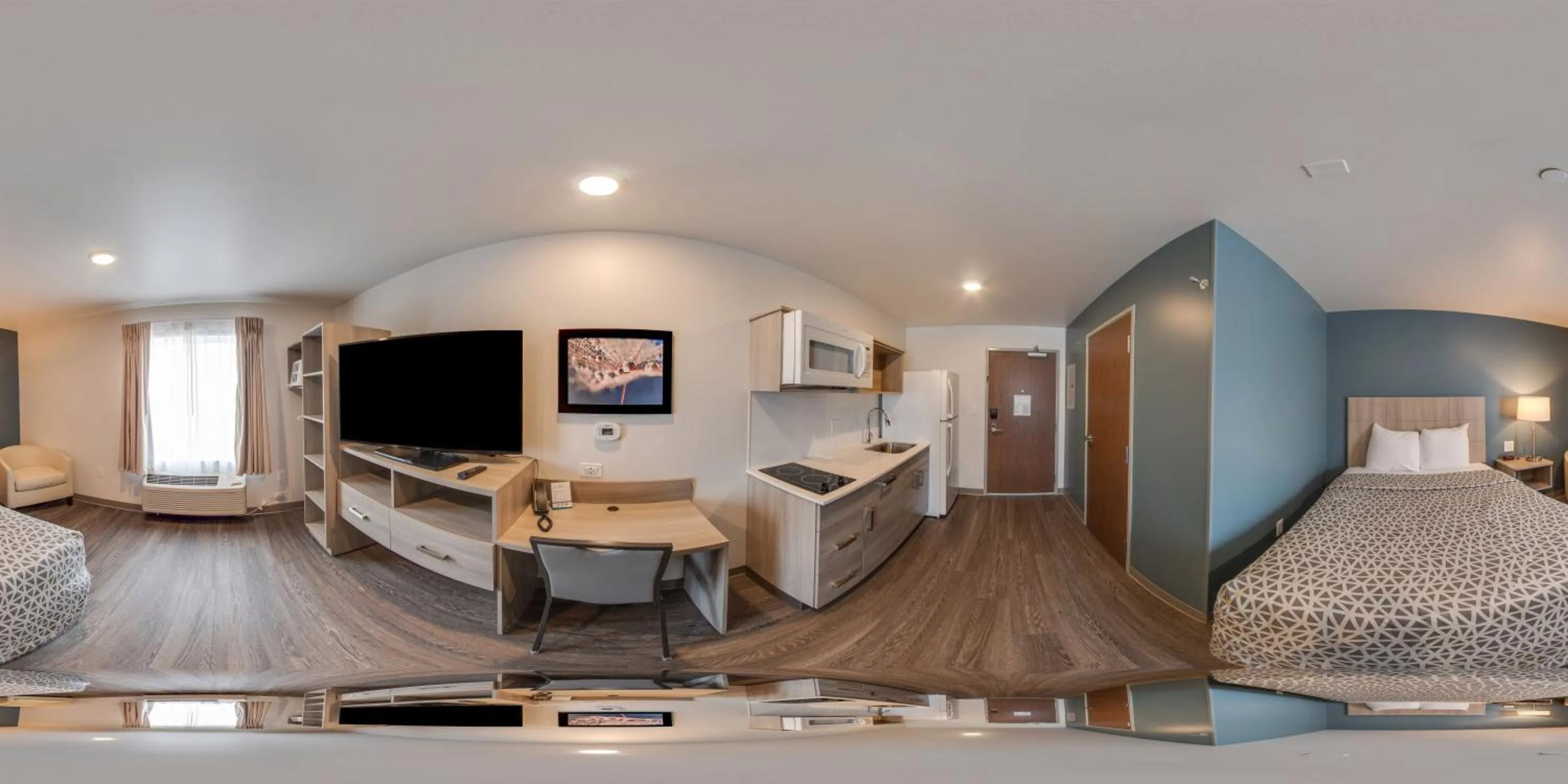 Photo of the whole room, Bed in WoodSpring Suites Grand Rapids Kentwood