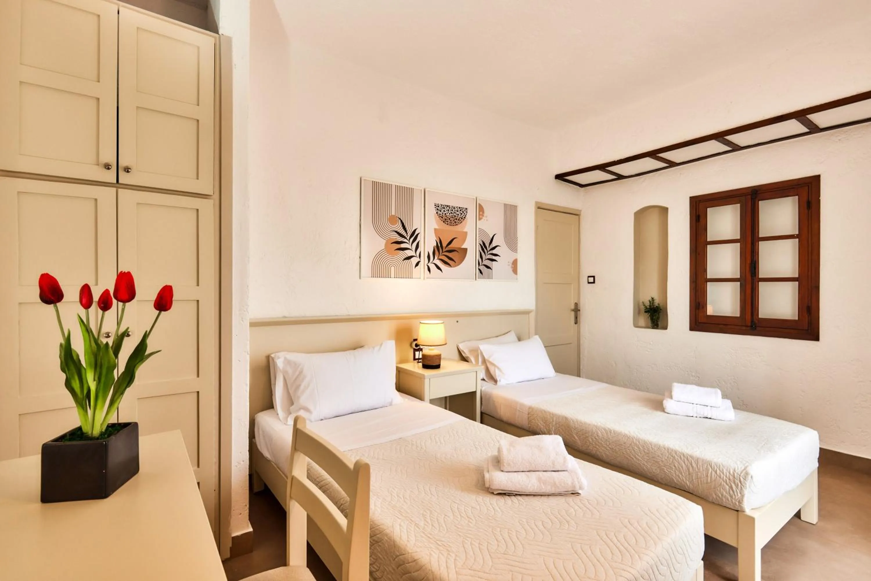 Bed in Mila Malia Studios Hotel